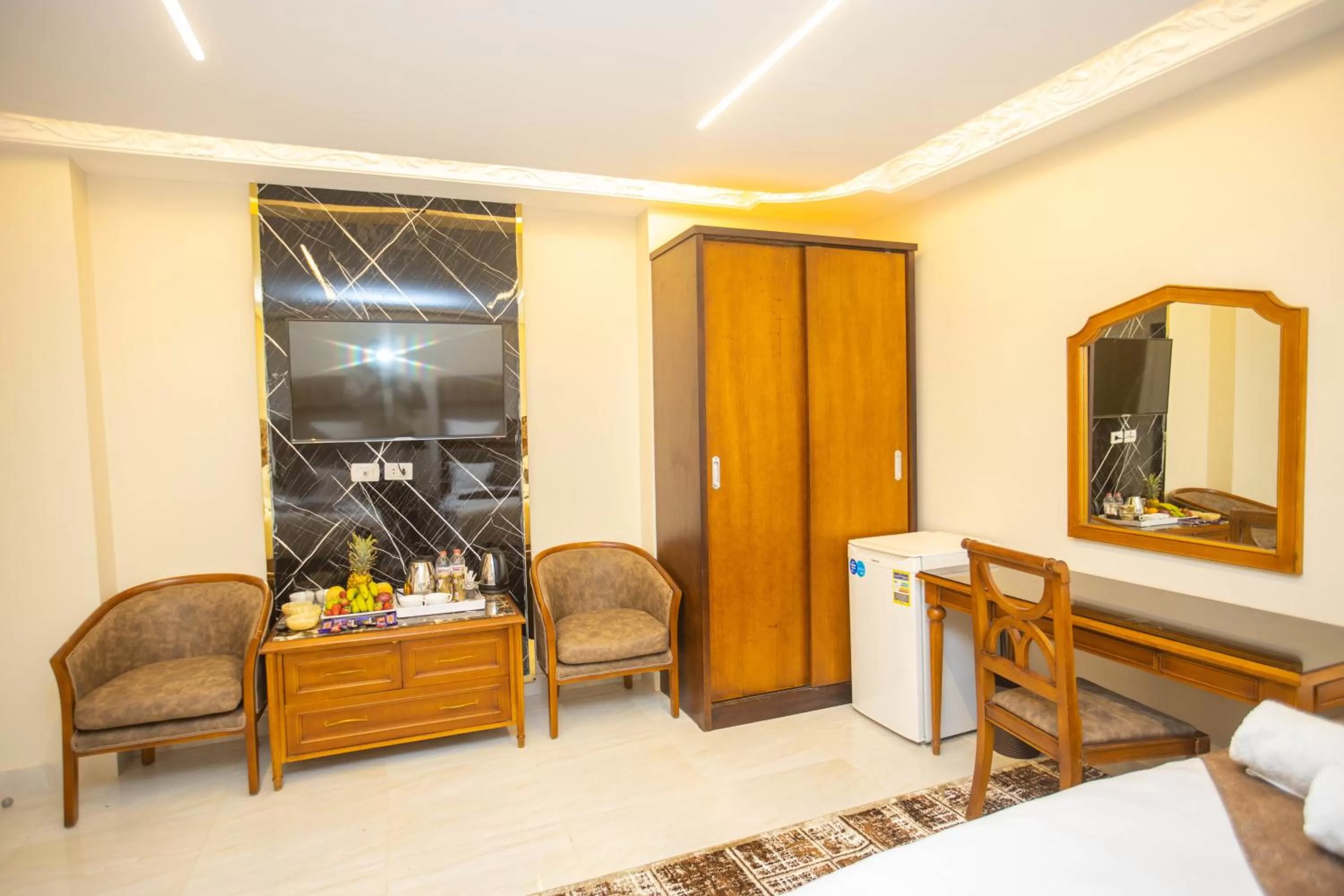 Bed, TV/Entertainment Center in The Muse Pyramids