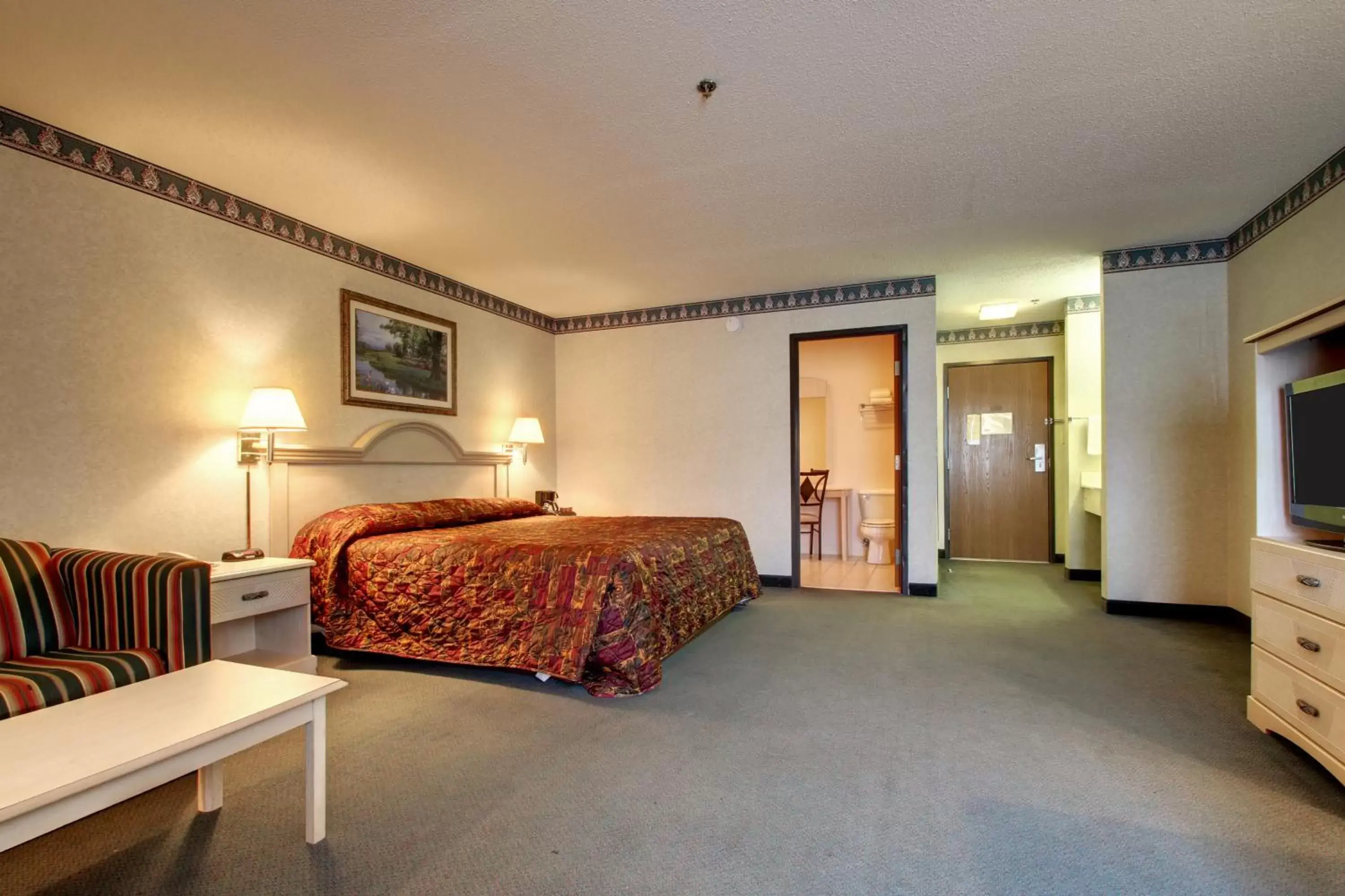 Bedroom, Bed in Key West Inn - Baxley