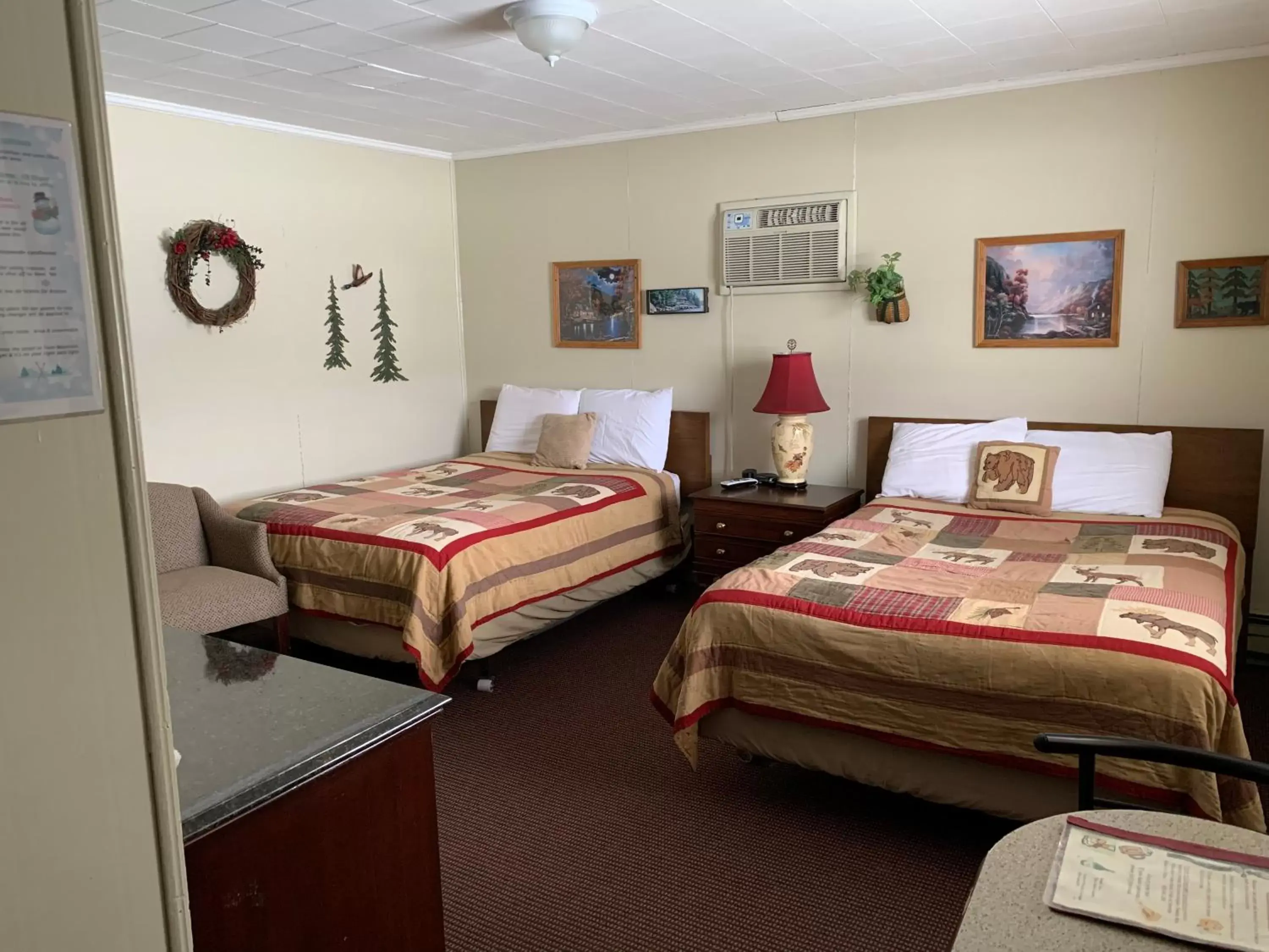 Bed in carrollmotel and cottages