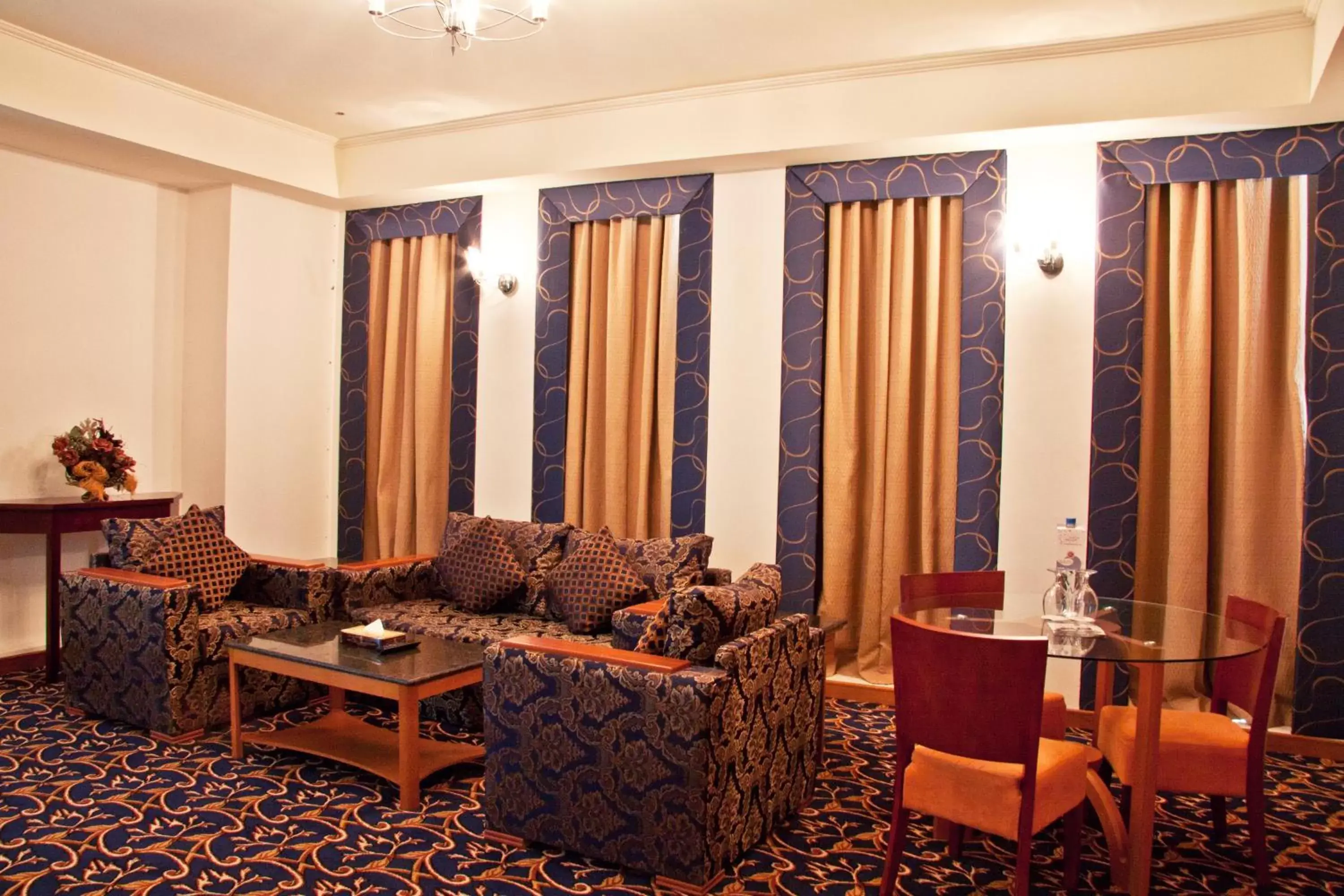 Living room in Ramee Rose Hotel