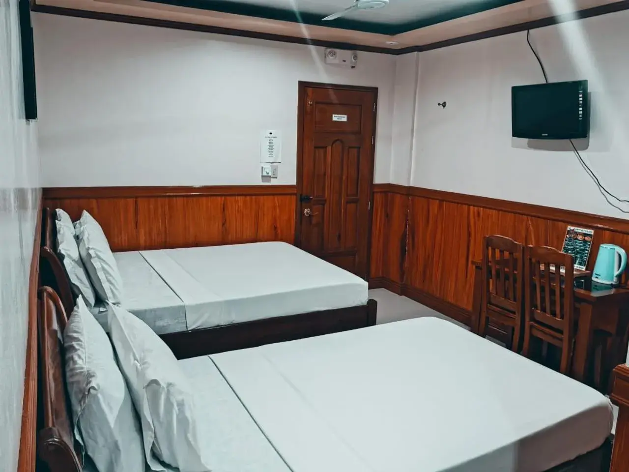 Bed in Garnet Hotel