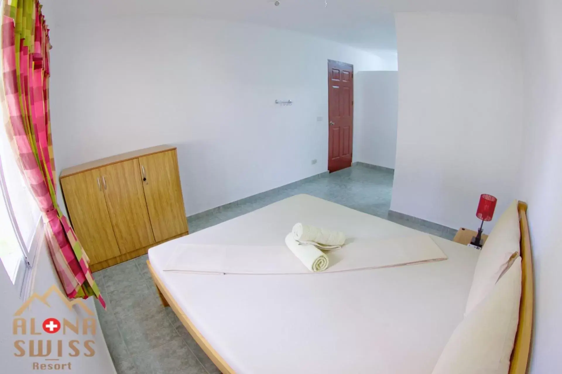 Bed in Alona Swiss Resort Bed in Alona Swiss Resort