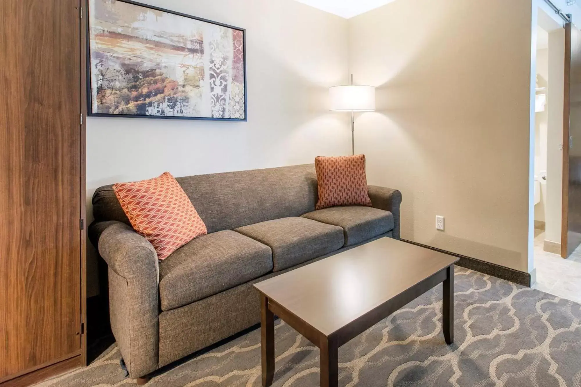 Seating Area in Country Inn & Suites by Radisson, Grandville-Grand Rapids West, MI