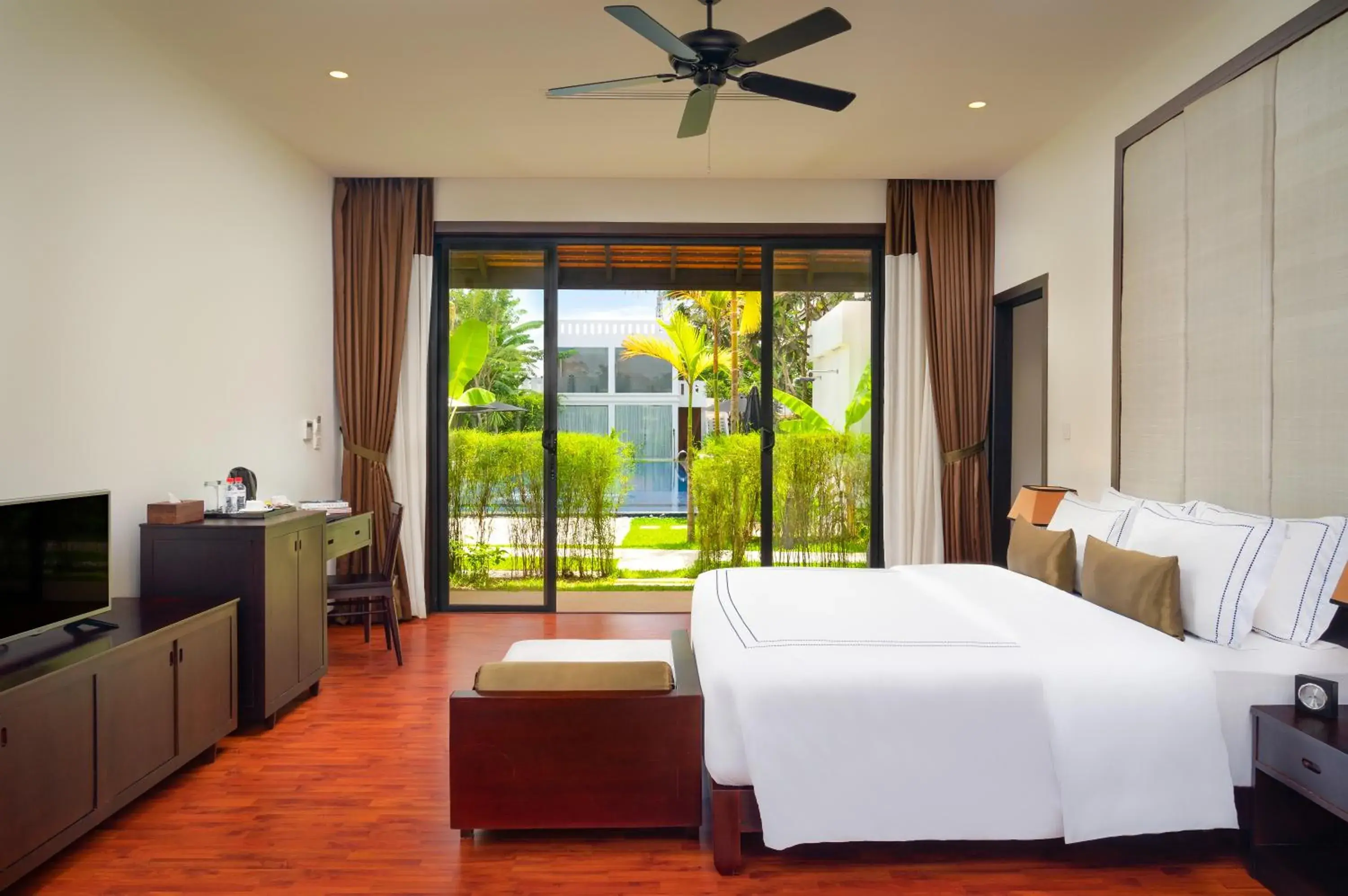 Bed in The Embassy Angkor Resort & Spa