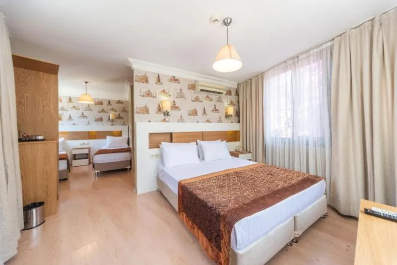 Bed in Tayahatun Hotel