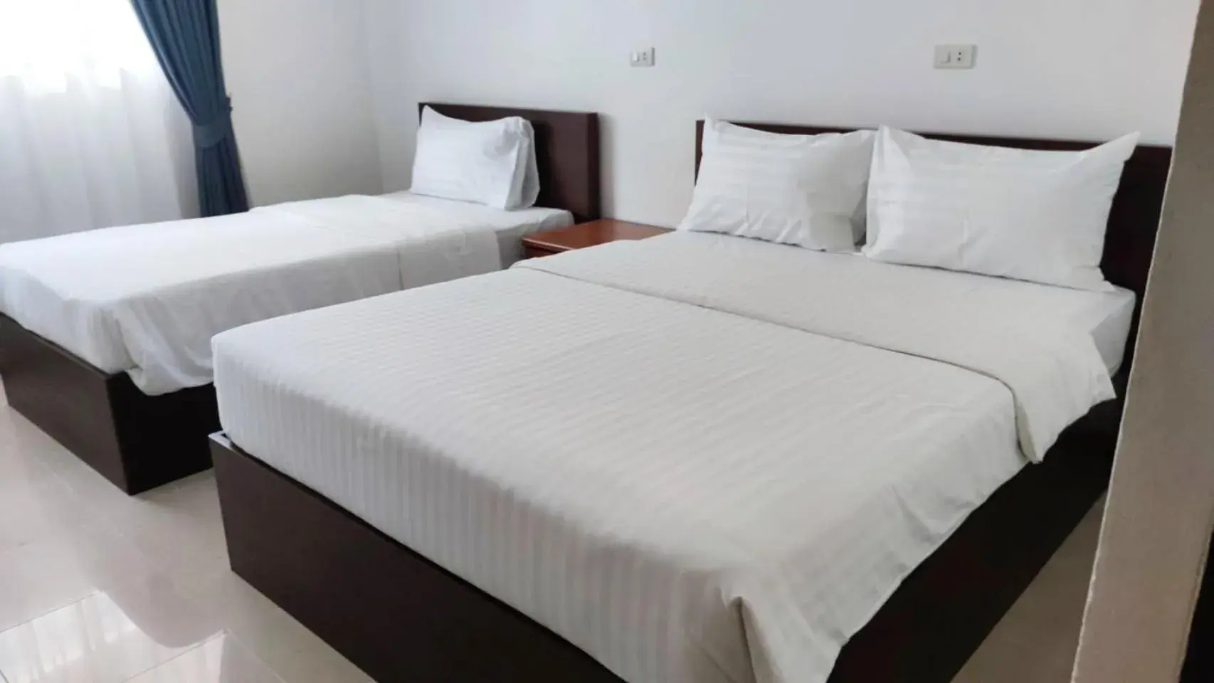 Bed in Atlas Bangkok Hotel