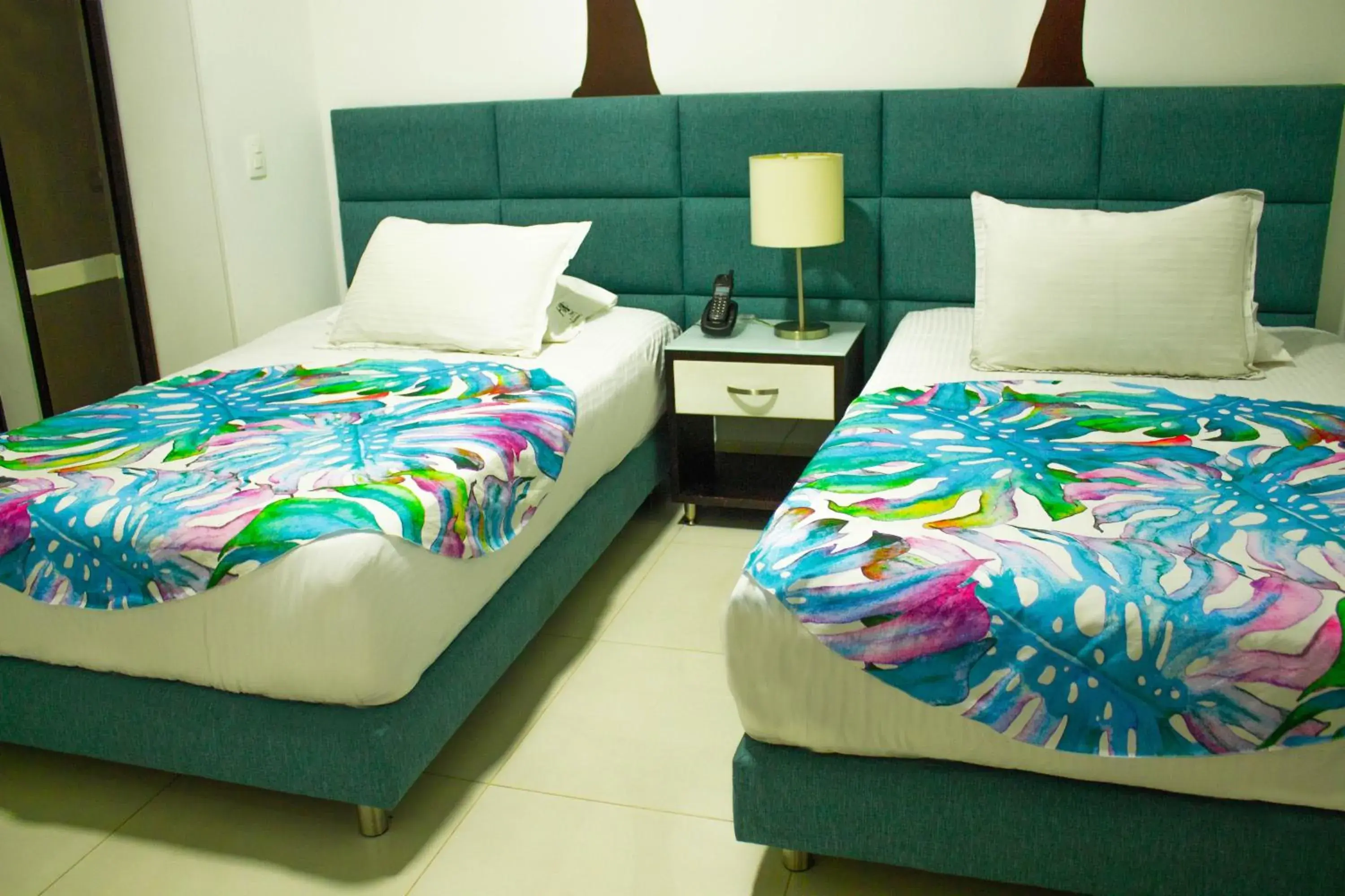 Bed in Hotel Bolivariana Plaza
