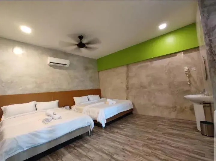 Bed in Rick Resort Teluk Intan