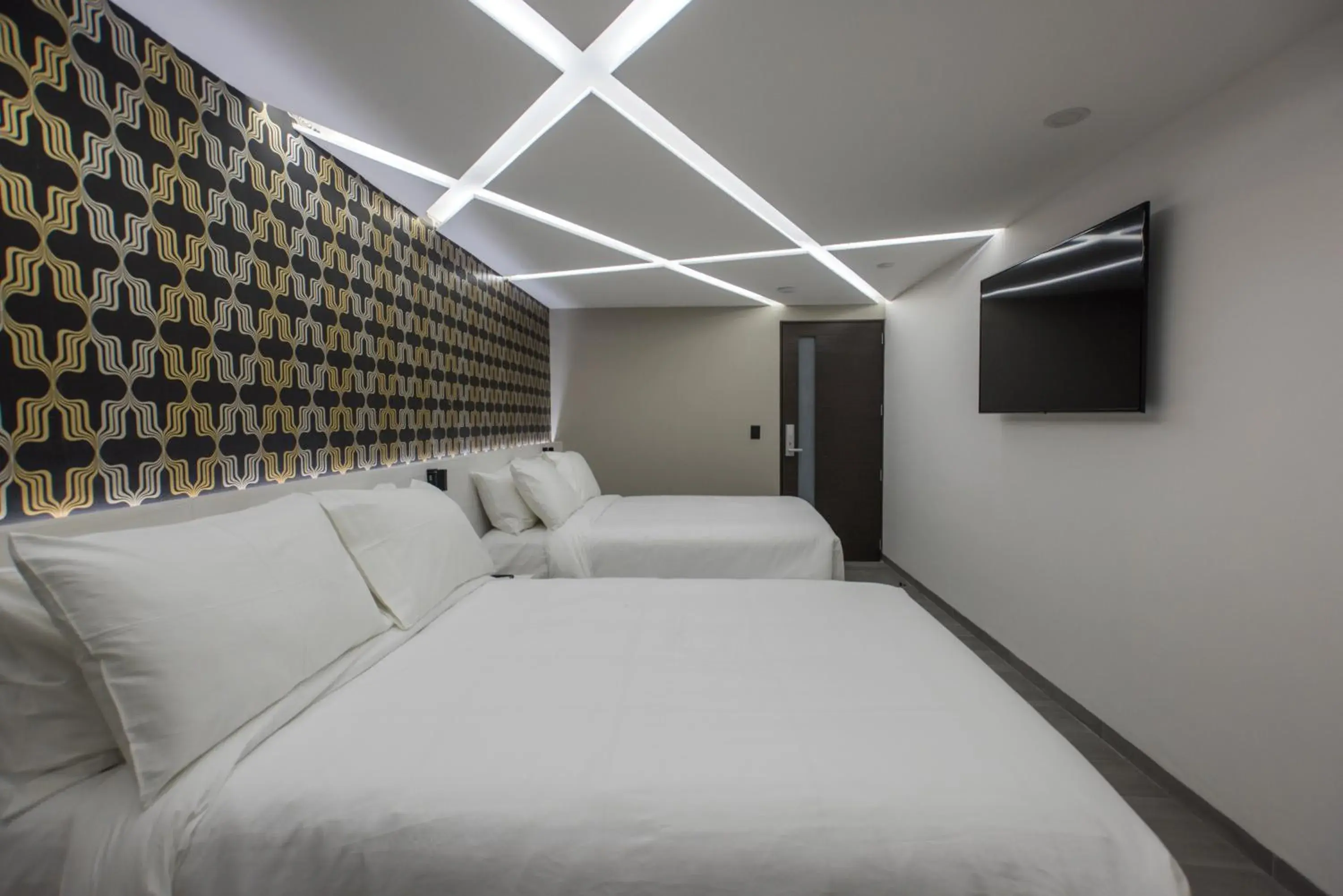 Deluxe Queen Room with Two Queen Beds in The Andy Hotel by DOT Boutique