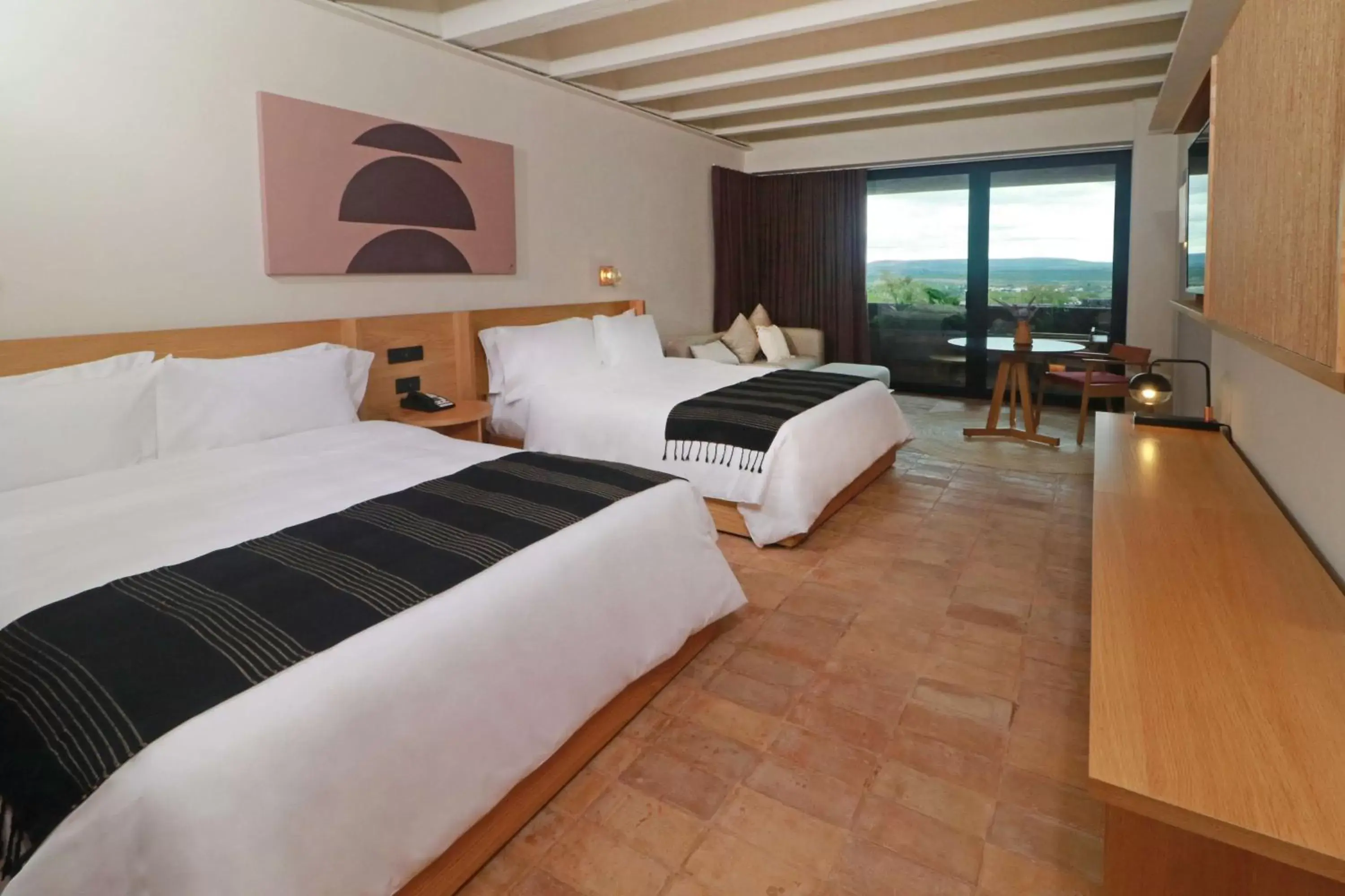 Living room, Bed in Albor San Miguel de Allende, Tapestry Collection by Hilton Living room, Bed in Albor San Miguel de Allende, Tapestry Collection by Hilton