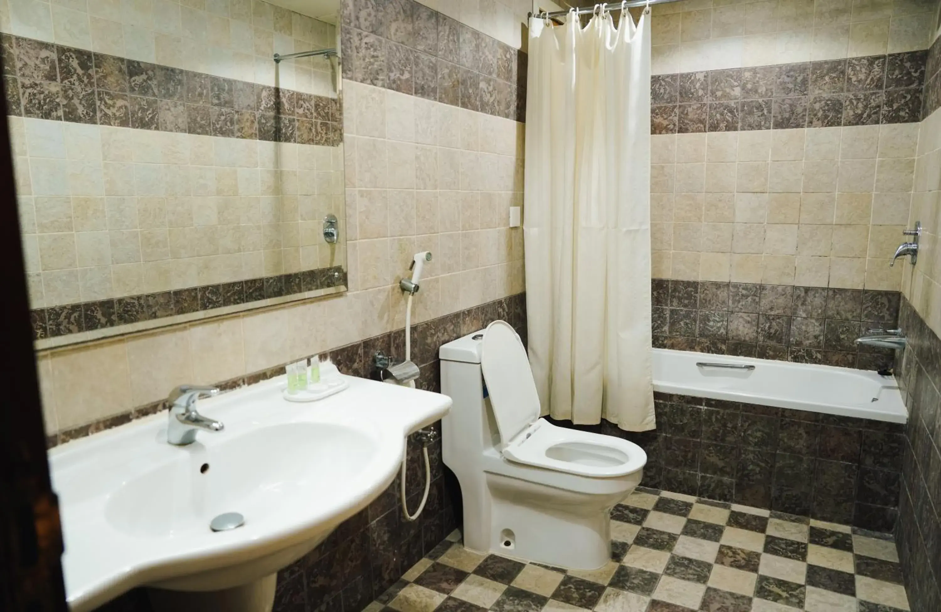 Two-Bedroom Suite in Safeer International Hotel By Brothers International Two-Bedroom Suite in Safeer International Hotel By Brothers International