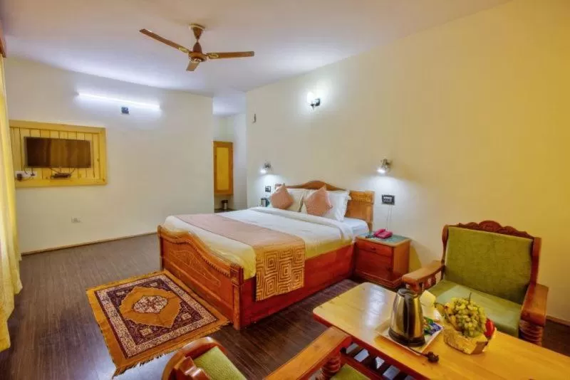 Bed in Ayushman Hotels