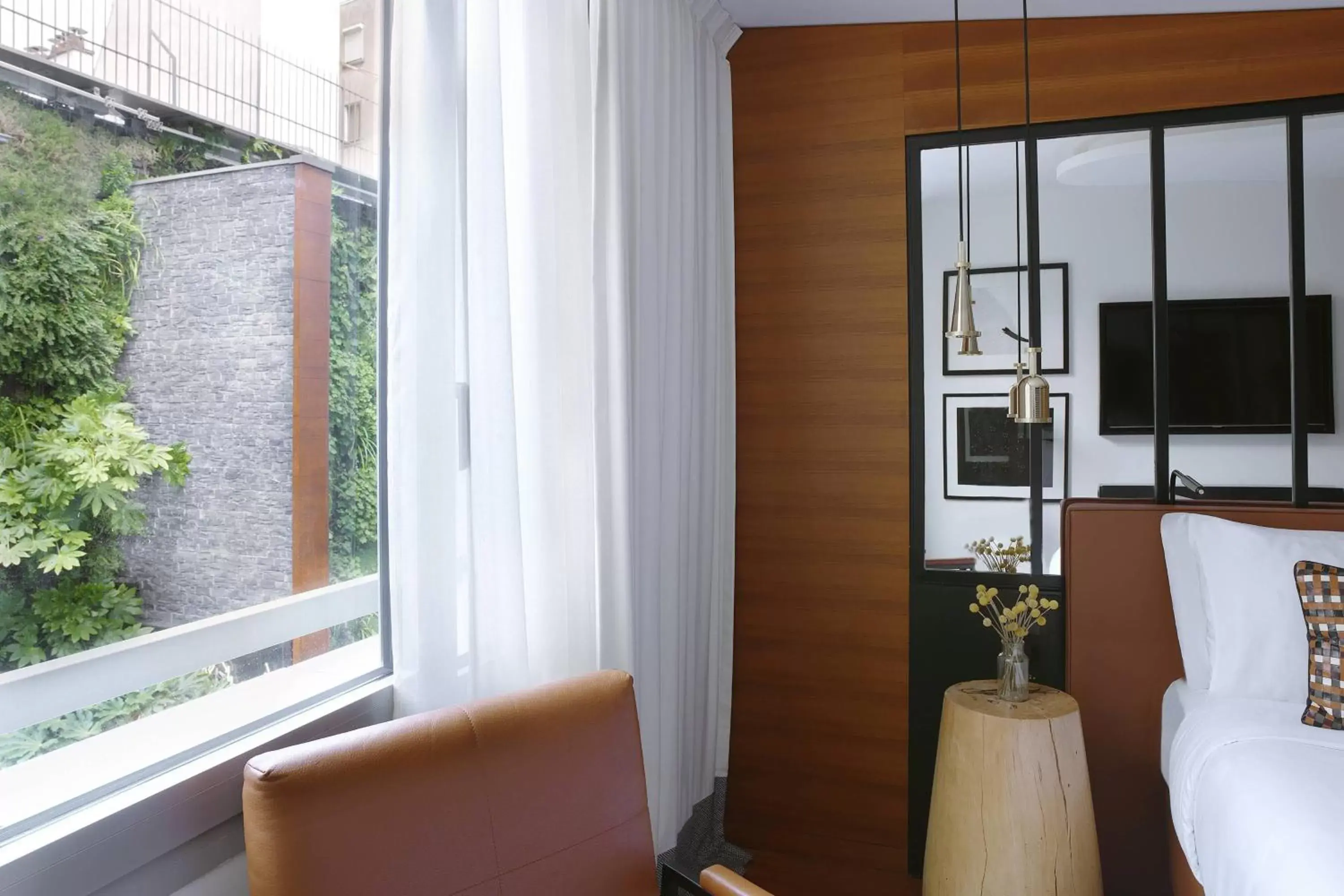 Photo of the whole room, TV/Entertainment Center in Renaissance Paris Republique Hotel & Spa