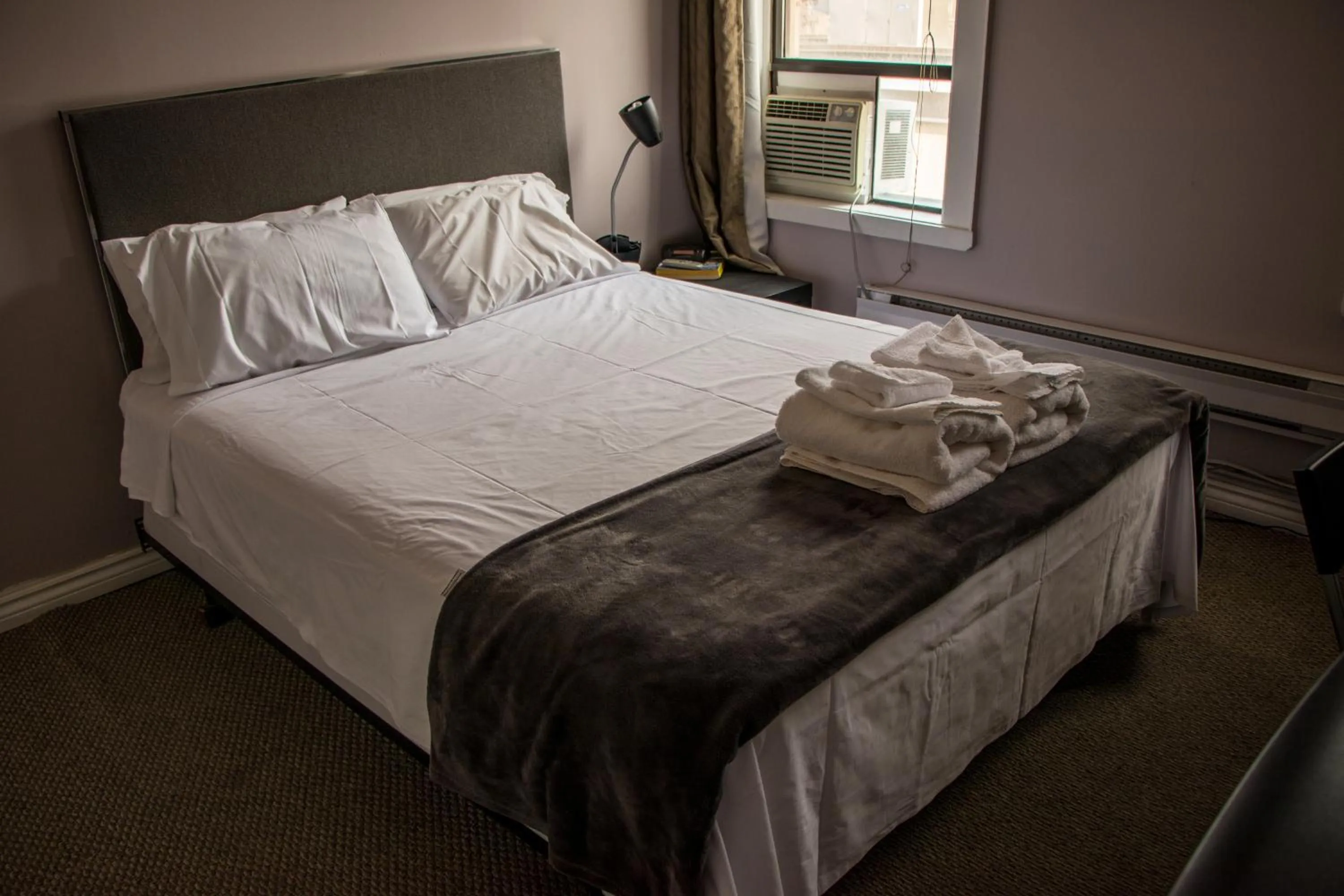 Bedroom, Bed in Saint Lawrence Residences and Suites