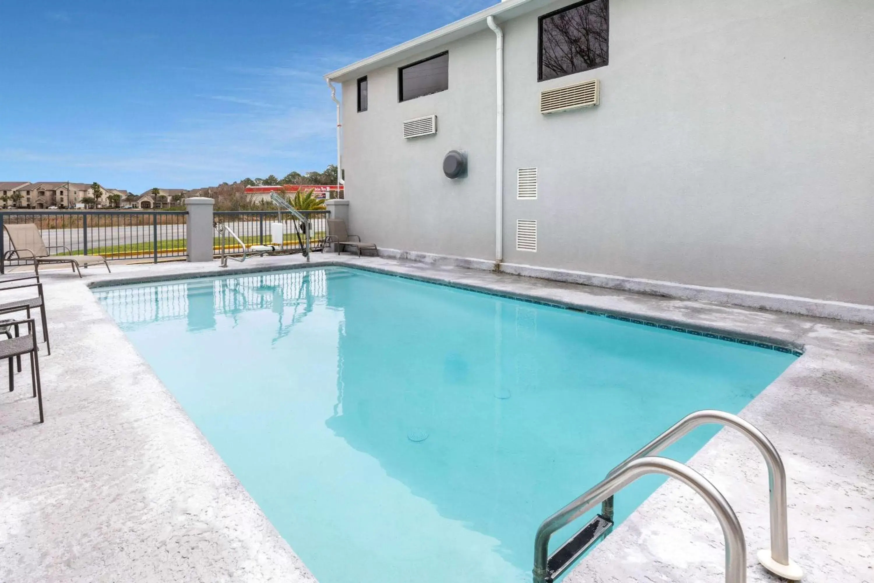 Pool view, Swimming Pool in Baymont by Wyndham Biloxi - Ocean Springs