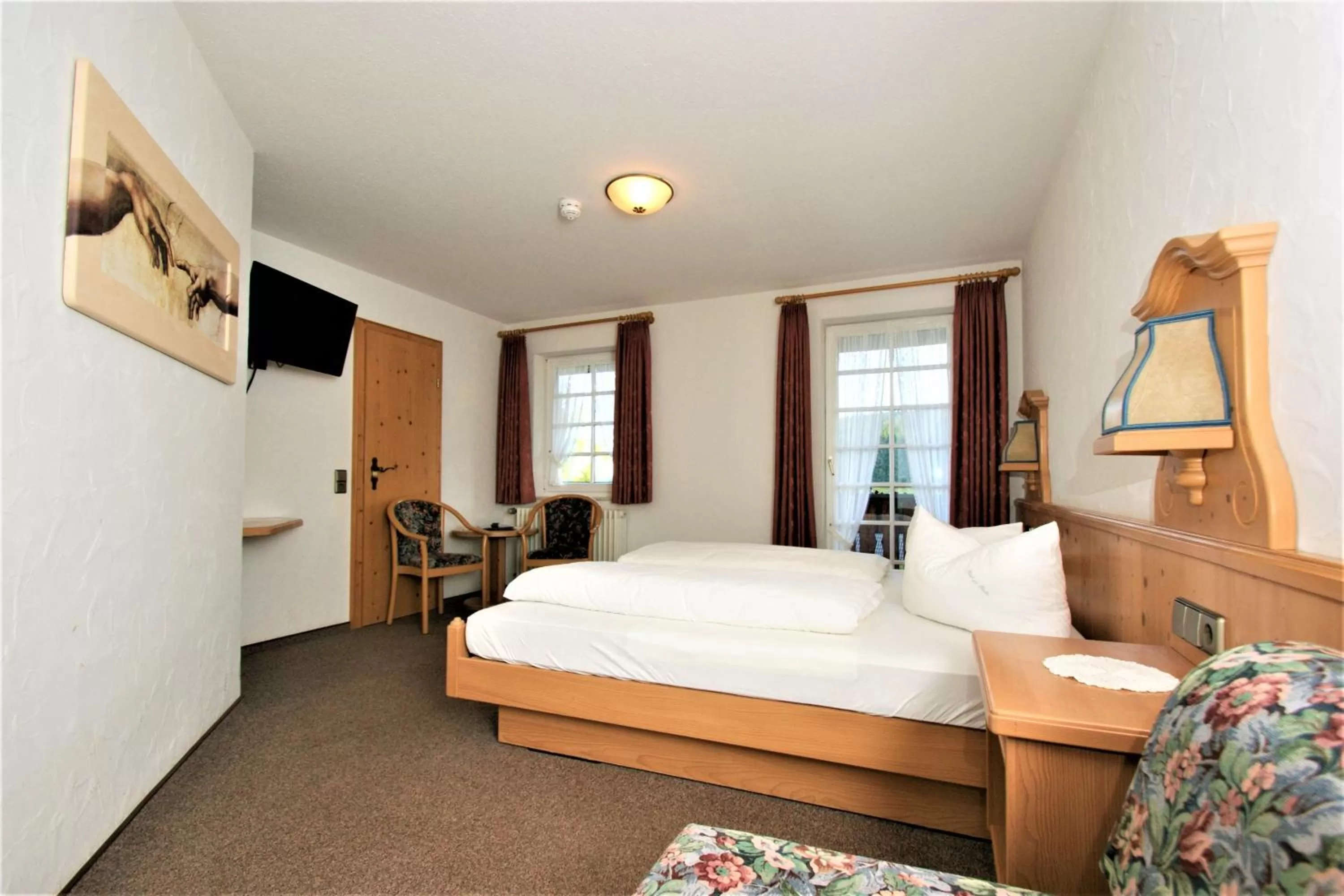 Photo of the whole room, Bed in ZUR TRAUBE Schwarzwaldhotel & Restaurant am Titisee