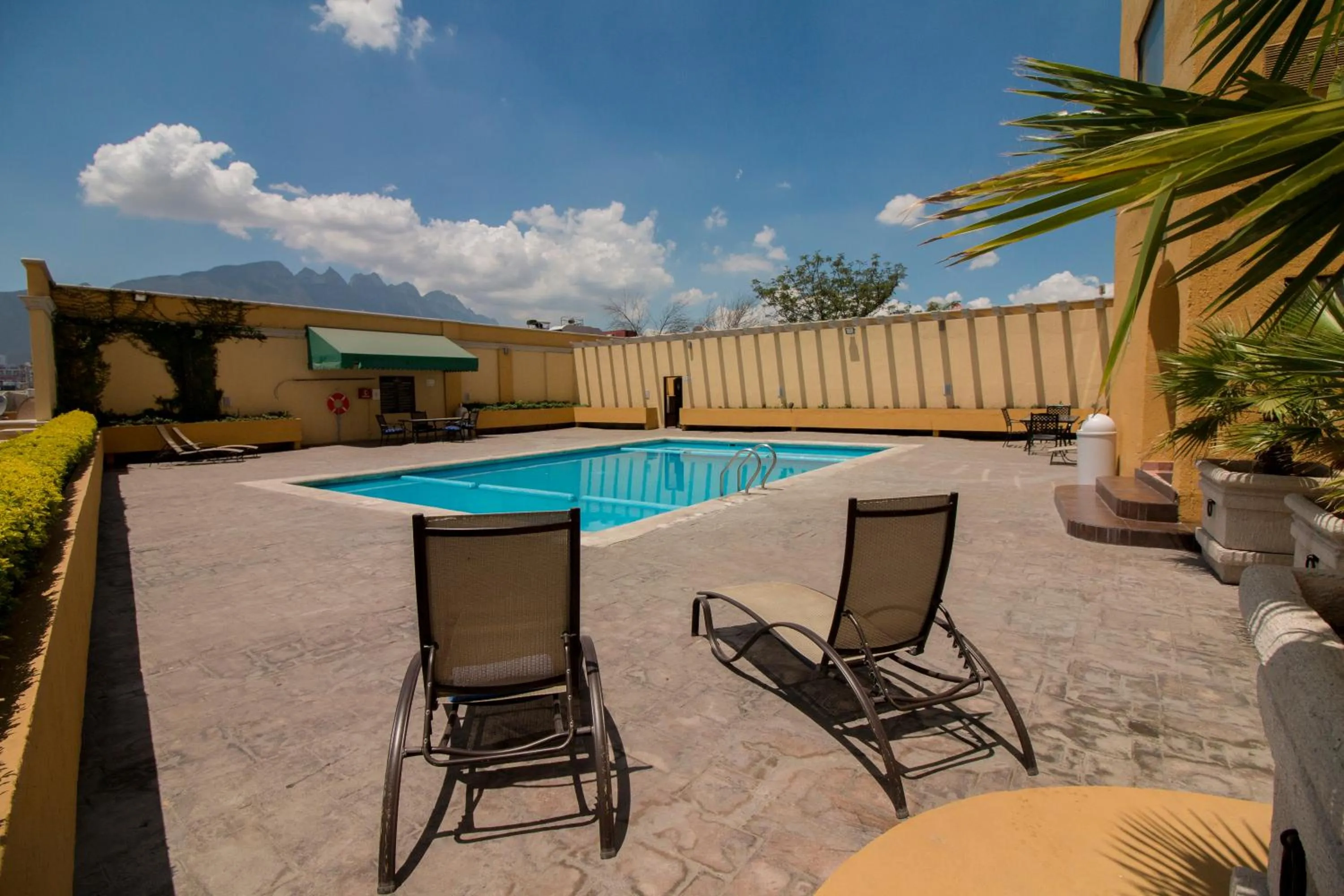 Swimming pool in CHN Hotel Monterrey Norte, Trademark Collection by Wyndham