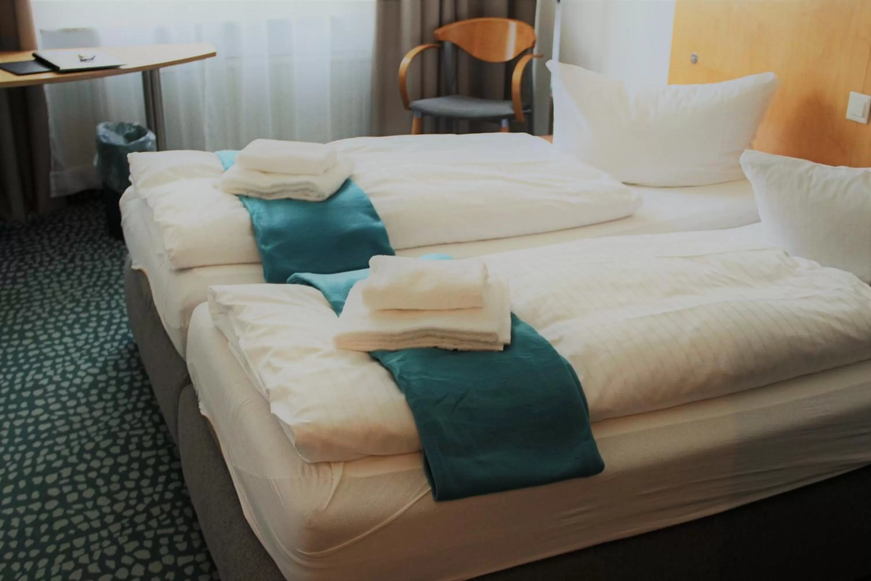 Bed in Check Inn Hotel Merseburg