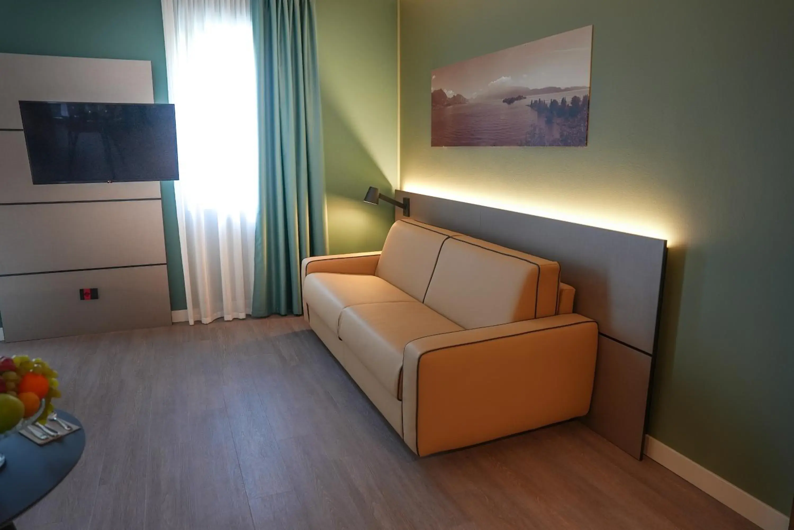 Bedroom, Seating Area in Hotel Puccini