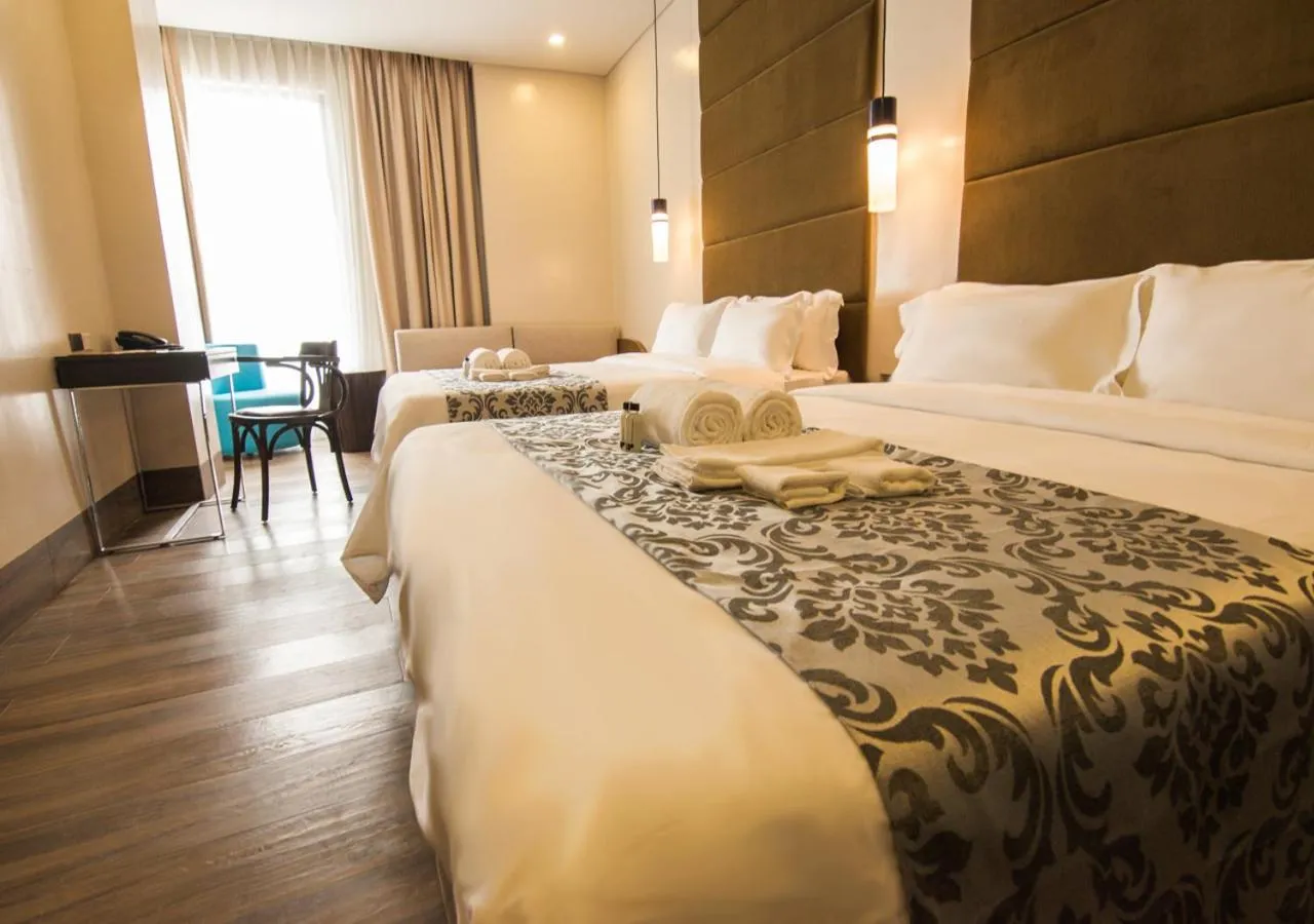 Bed in Goldberry Lite Hotel