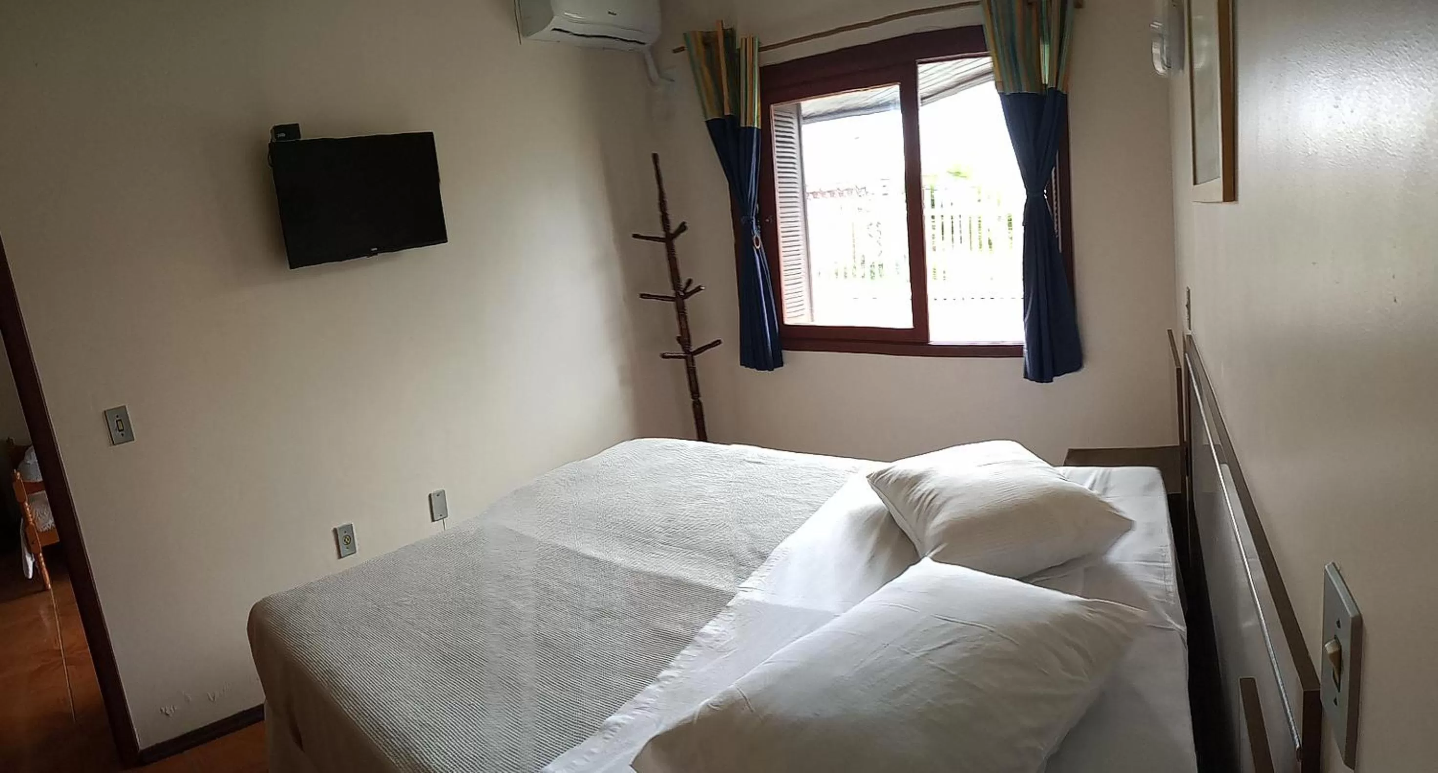 Bed in Pousada Japeju