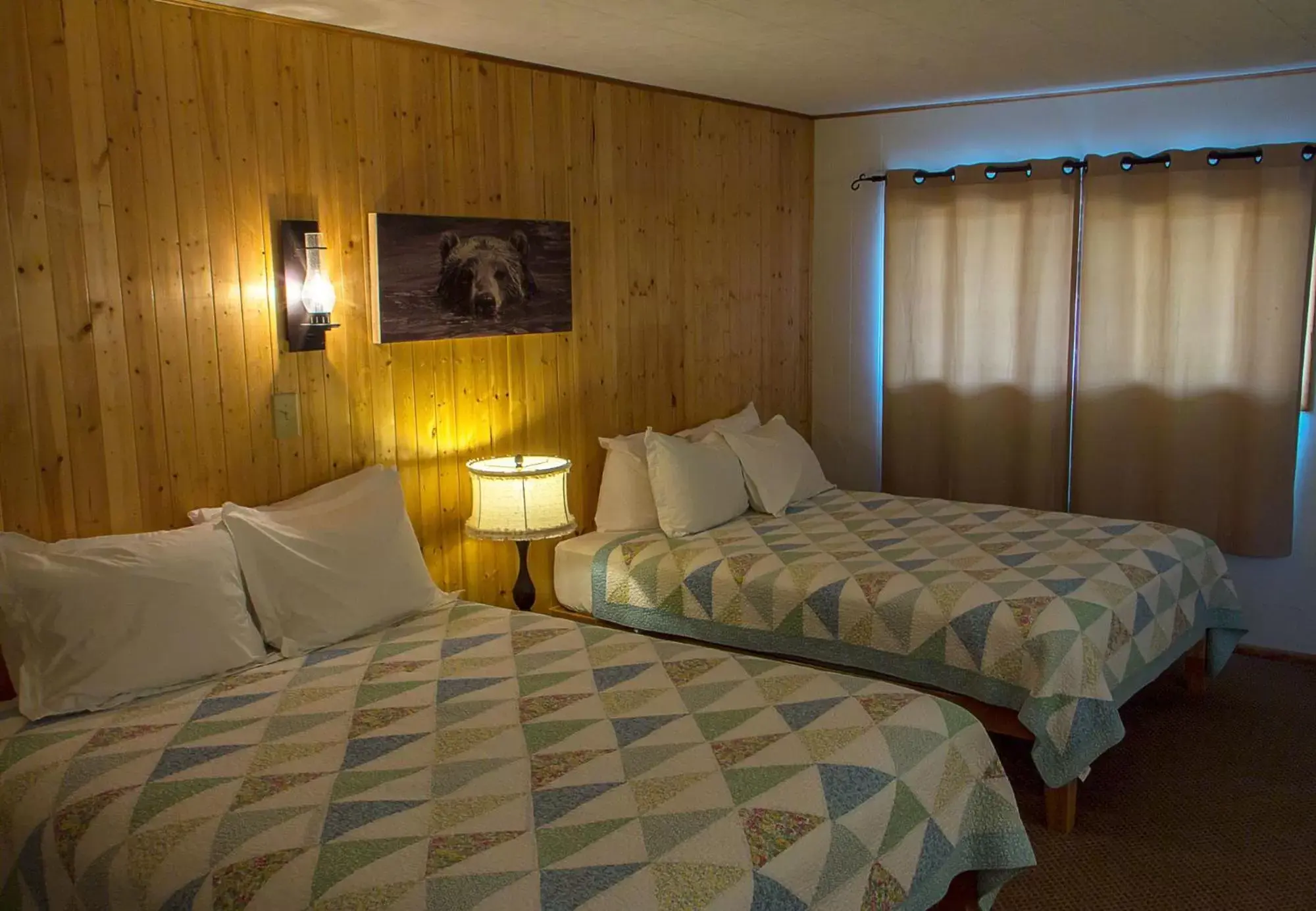 Bed in High Country Motel and Cabins