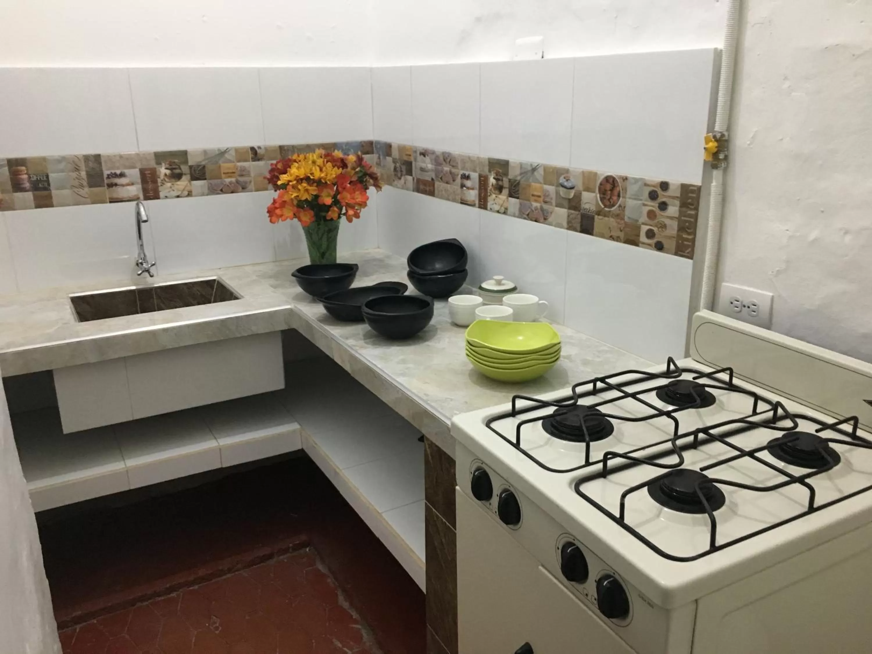 Kitchen/Kitchenette in Posada Turistica Nakku