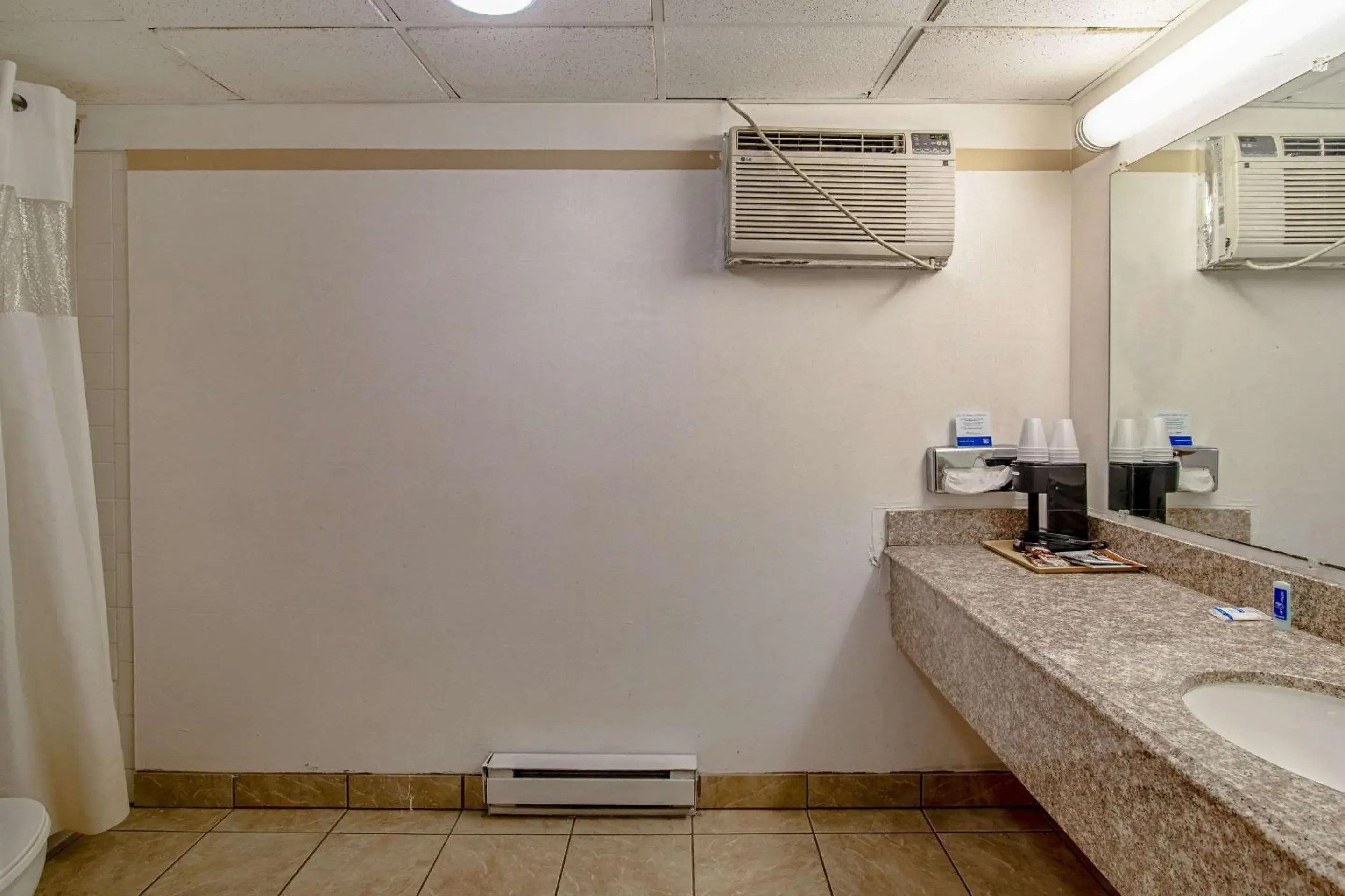 Photo of the whole room, Bathroom in Devils Lake Inn