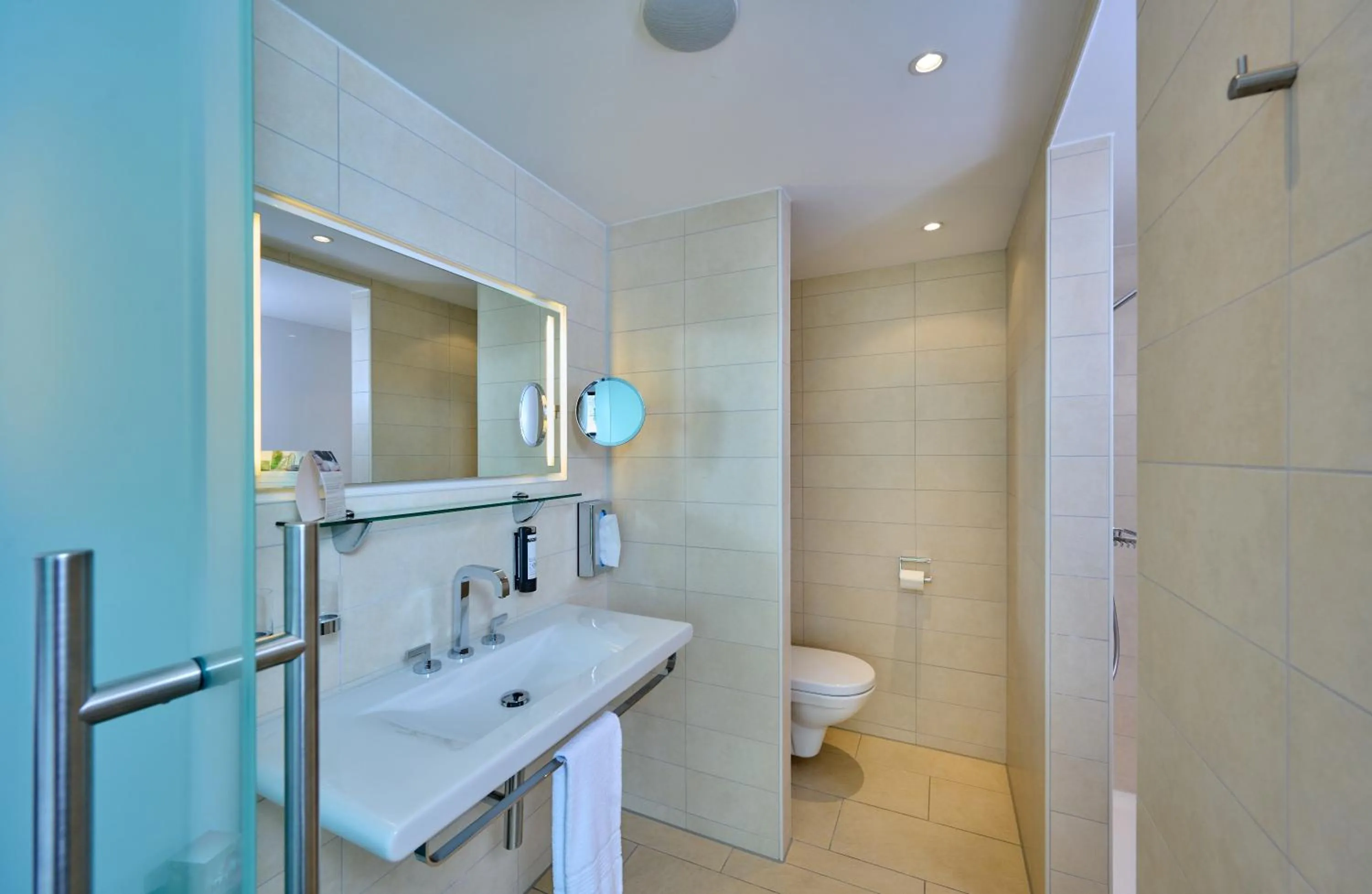 Bathroom in Asam Hotel