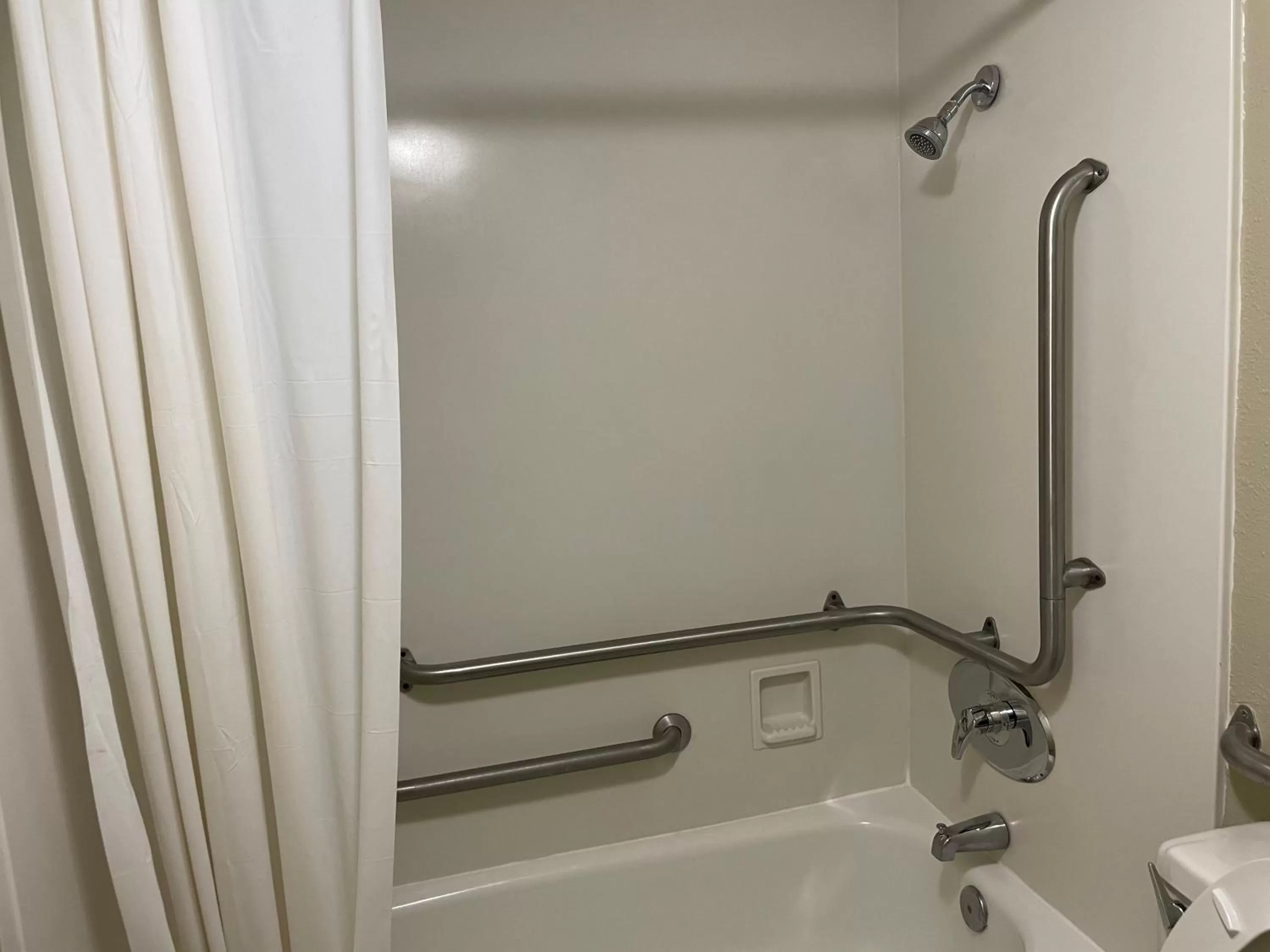 Bath in Travelodge by Wyndham Tuscaloosa