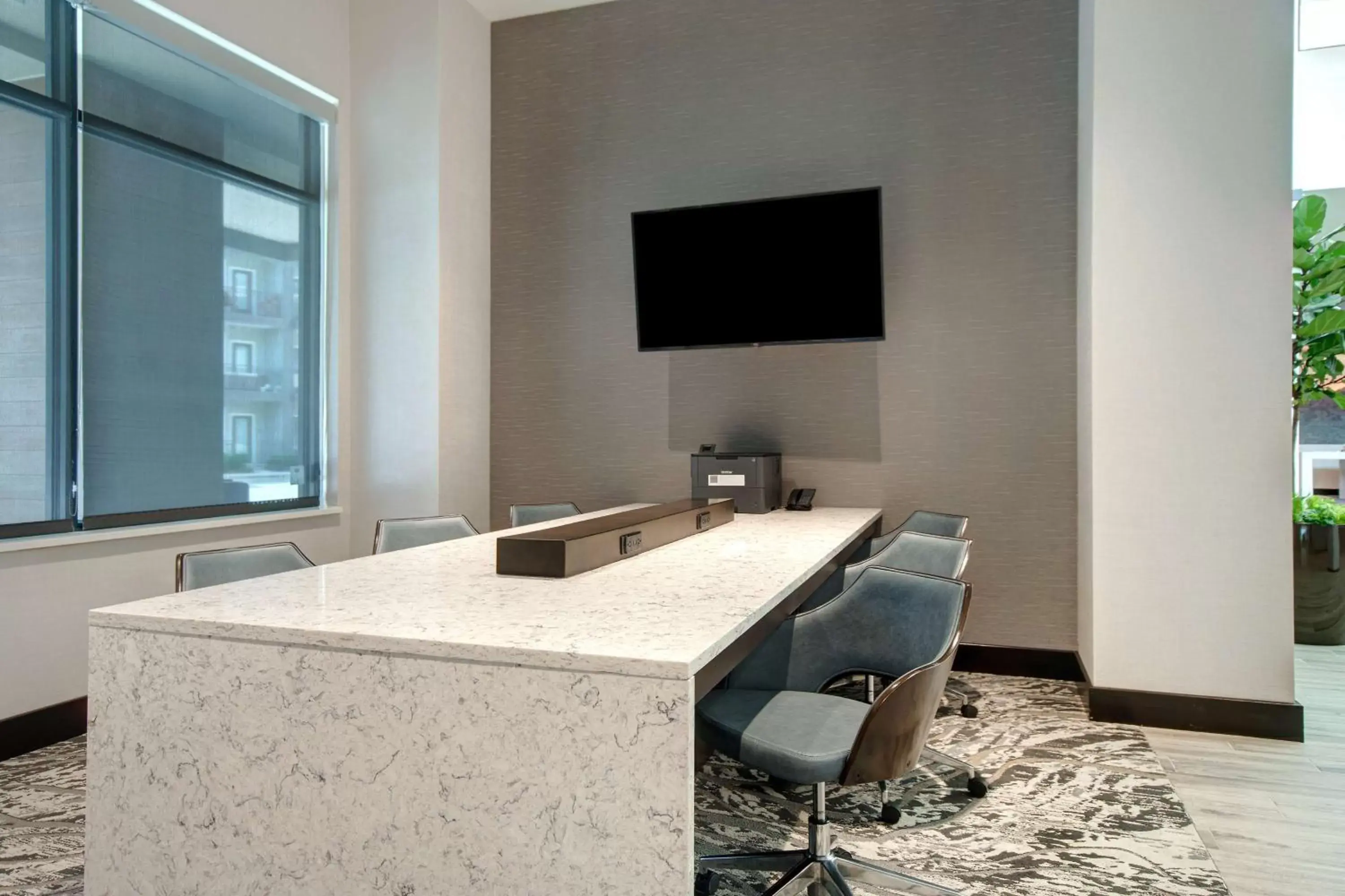 Lobby or reception in Embassy Suites By Hilton Alpharetta Halcyon Lobby or reception in Embassy Suites By Hilton Alpharetta Halcyon