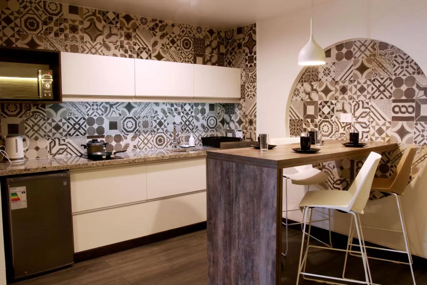 Kitchen or kitchenette in Urban Suites Apart Hotel