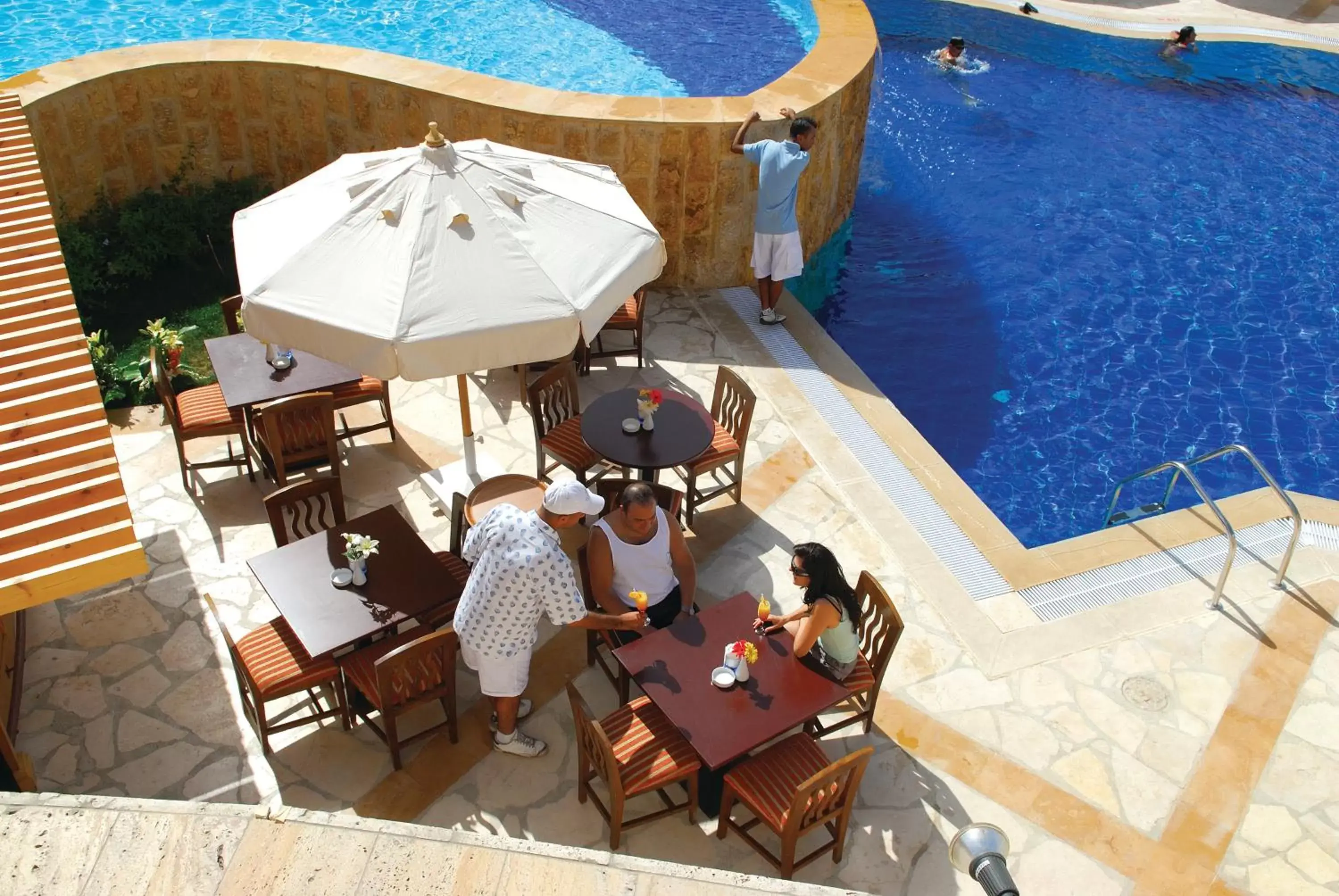 Staff, Pool View in Marina Plaza Hotel Tala Bay