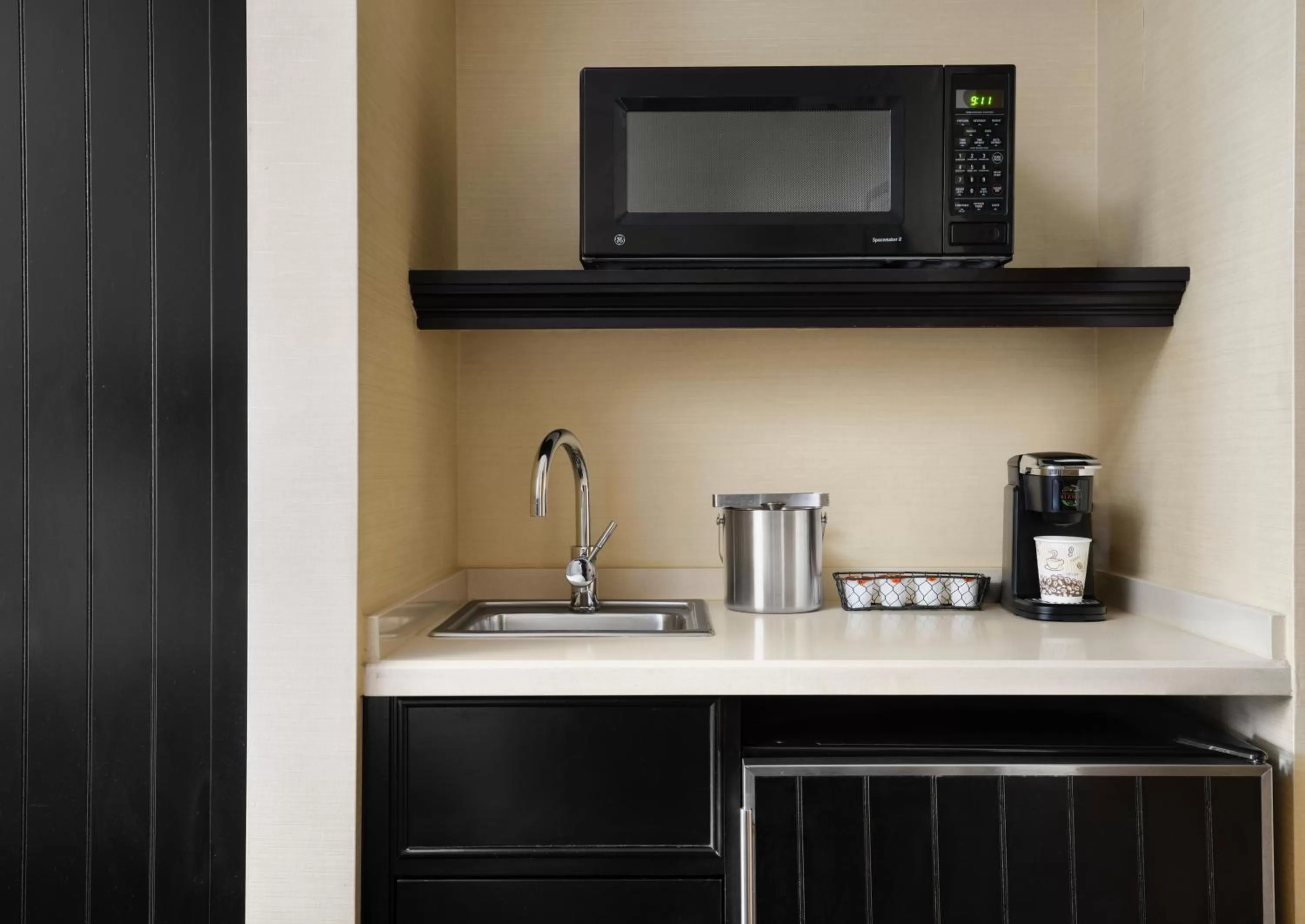 Kitchen or kitchenette in West Inn & Suites