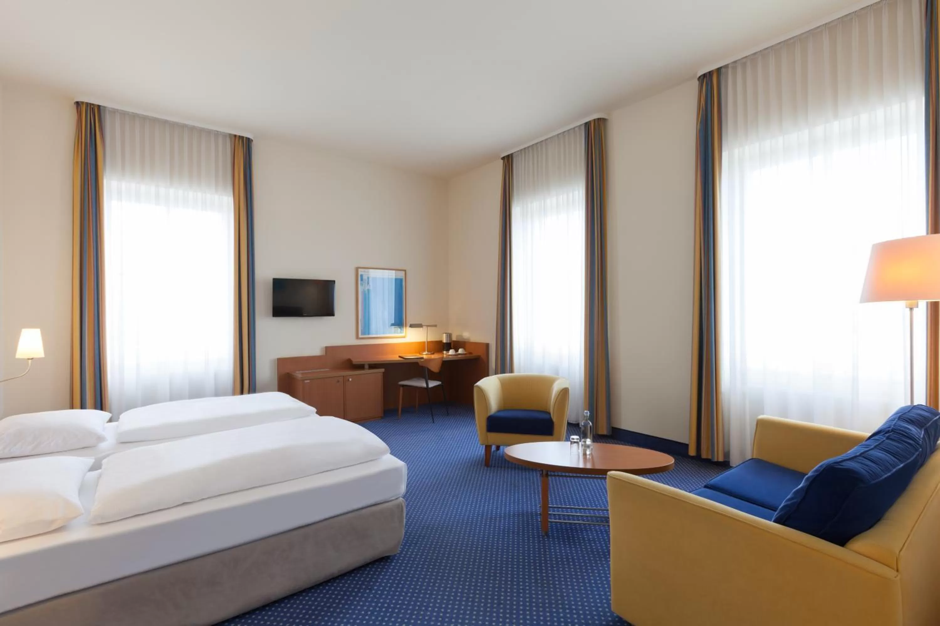 Living room, Bed in Vienna House by Wyndham Baltic Stralsund