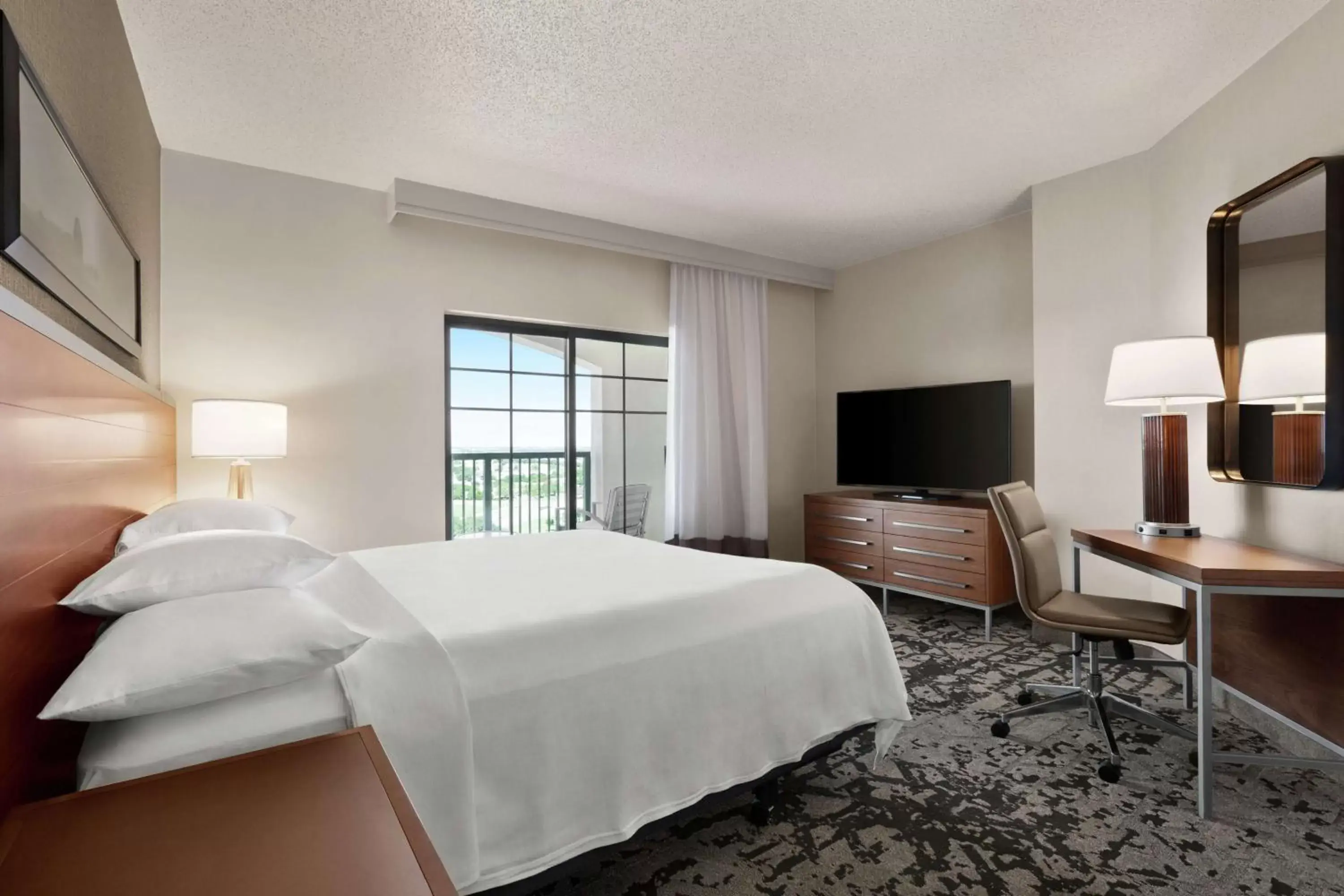 Bedroom in Embassy Suites Dallas - DFW Airport North