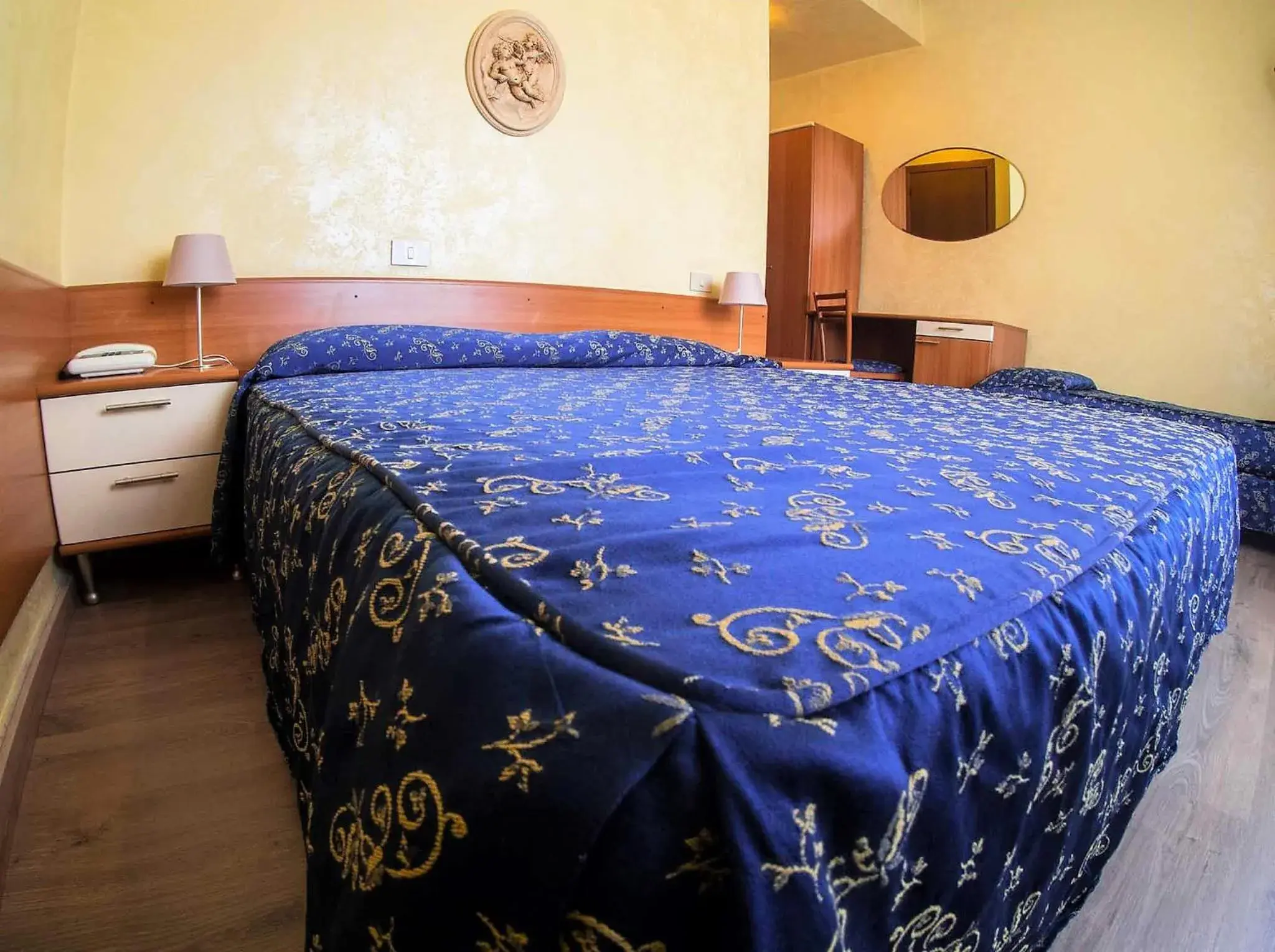 Bed in Albergo Dei Leoni