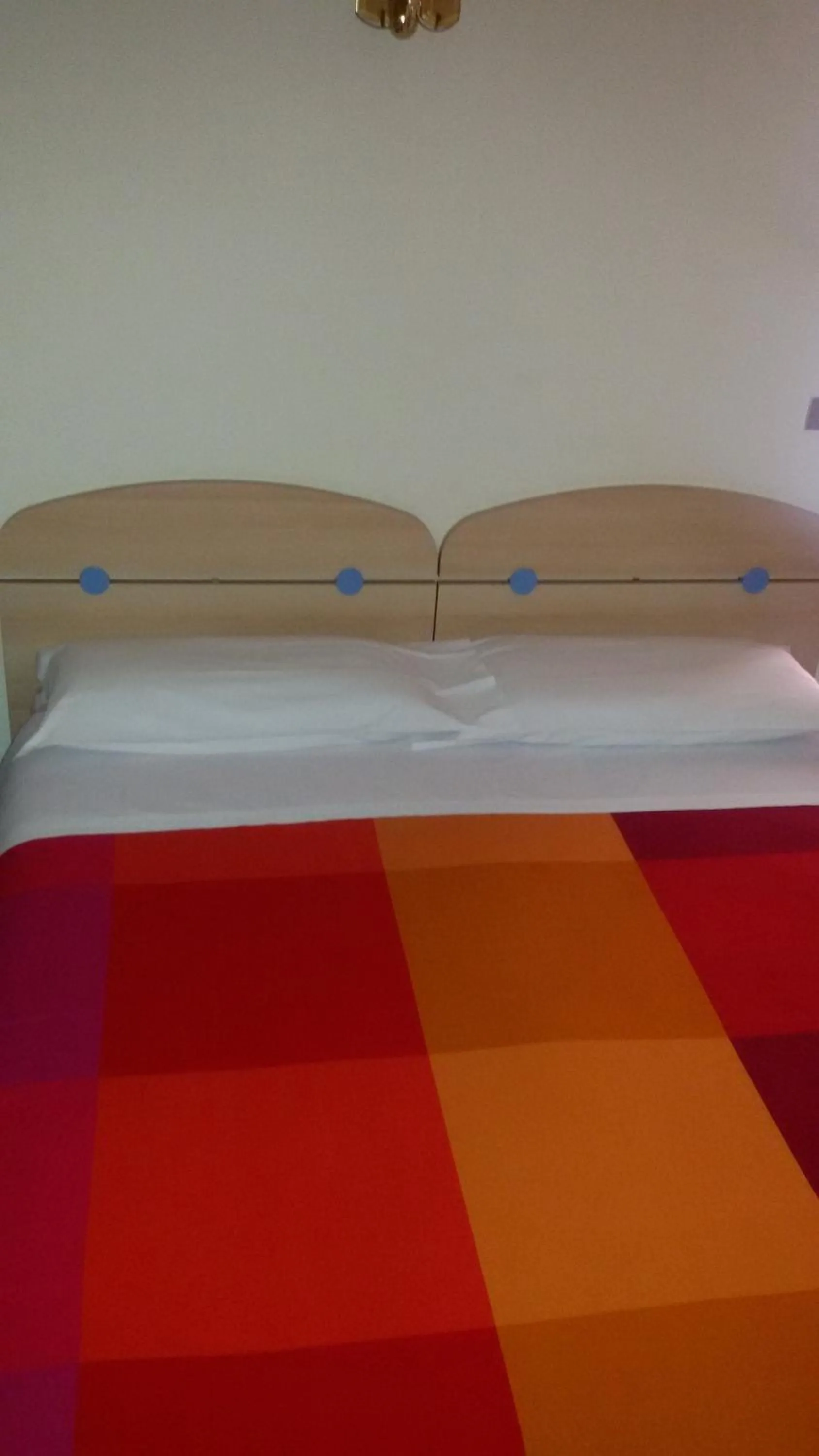 Bed in Albergo Luca