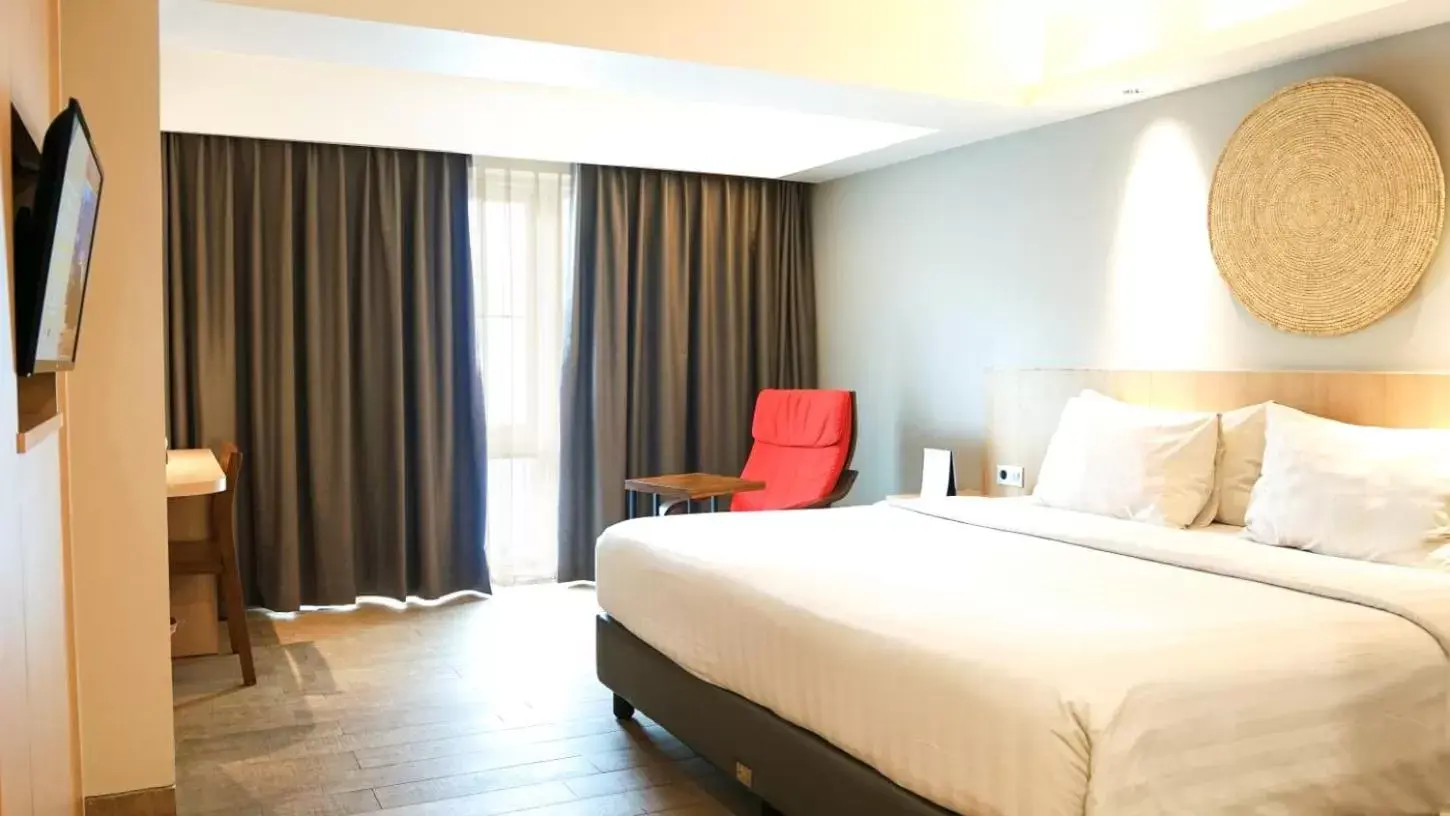 Bedroom, Bed in Aveta Hotel Malioboro - CHSE Certified