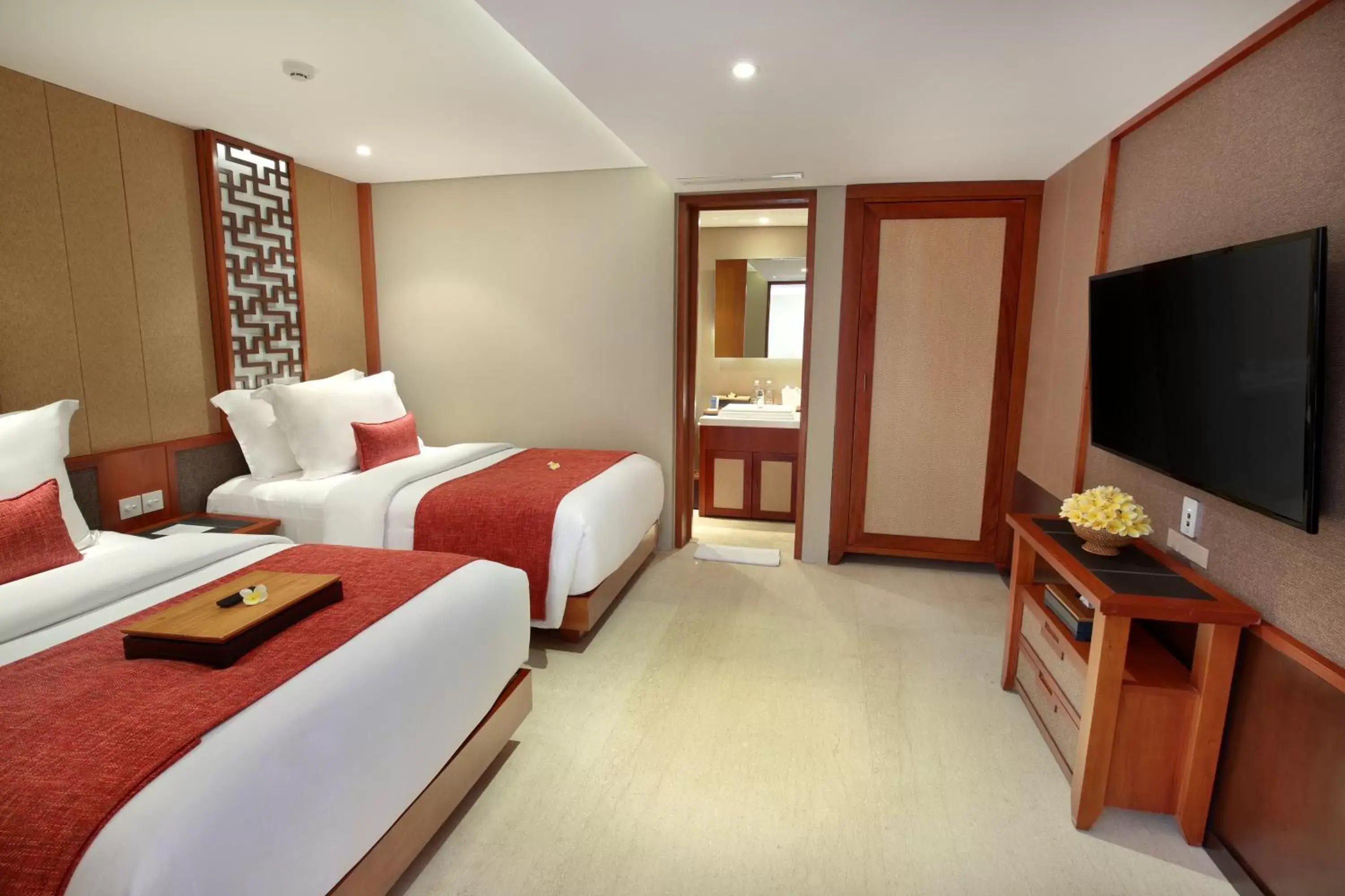 Bedroom, TV/Entertainment Center in The Bandha Hotel & Suites