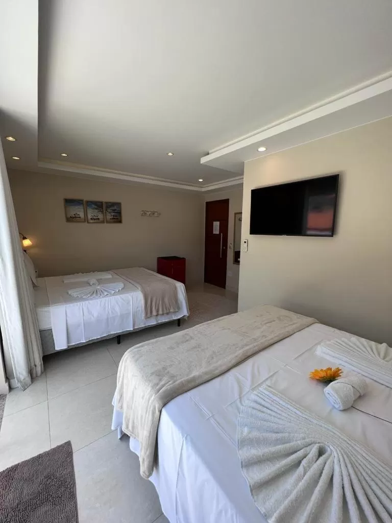 Bed in Pousada Arraial Tropical