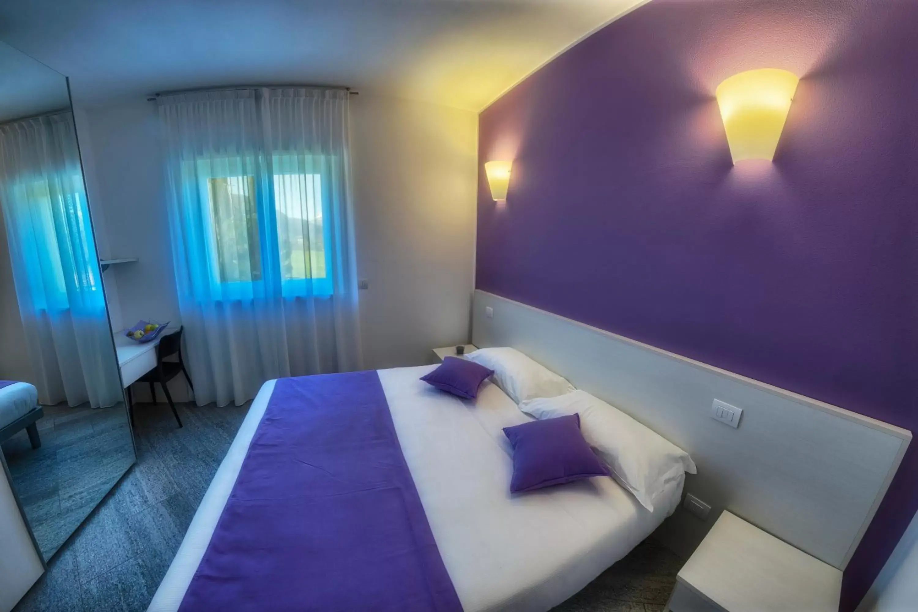 Photo of the whole room, Bed in Rainbow Holiday Apartments Lake Como