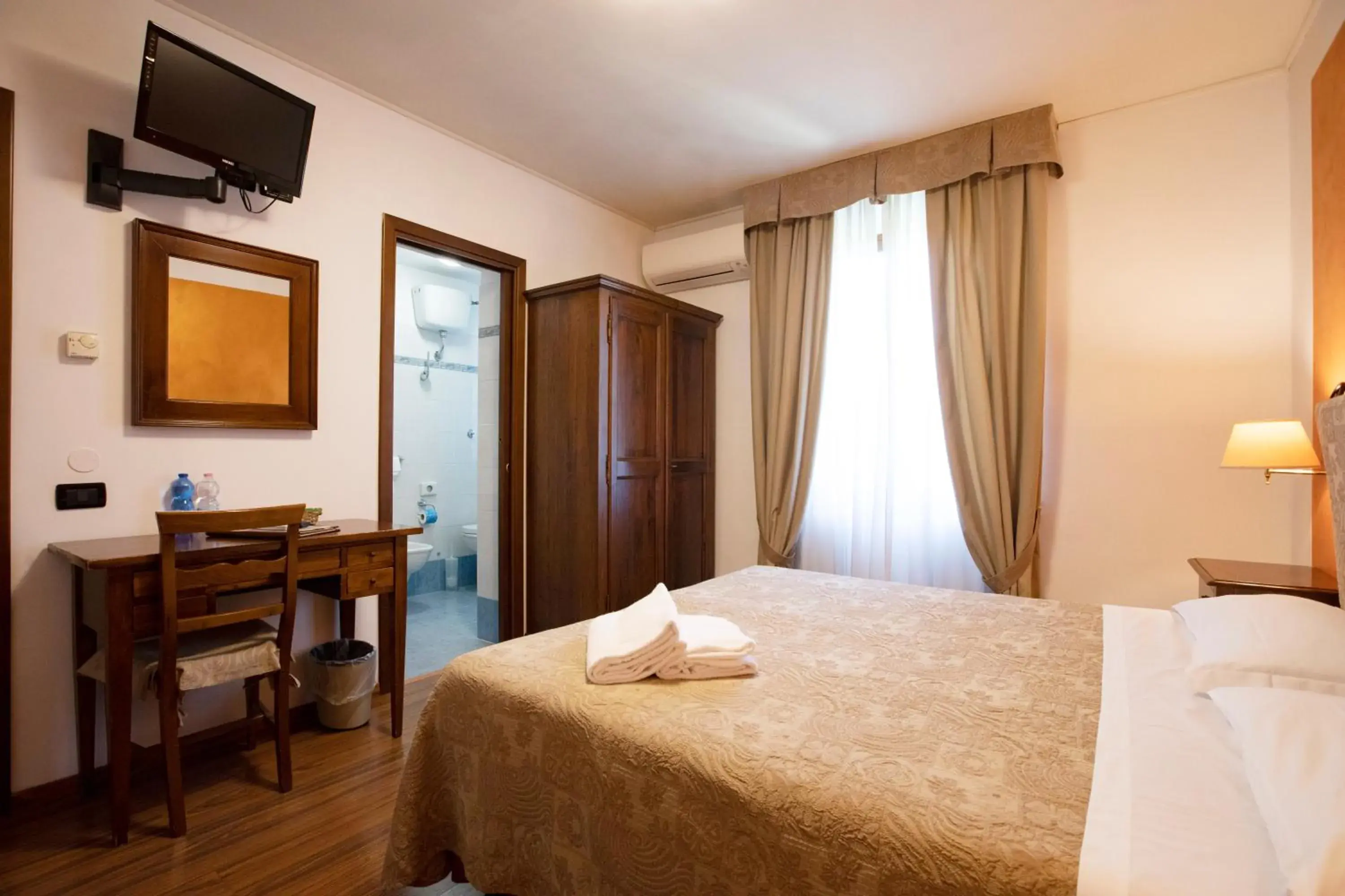 Photo of the whole room, Bed in Hotel Arcobaleno Siena