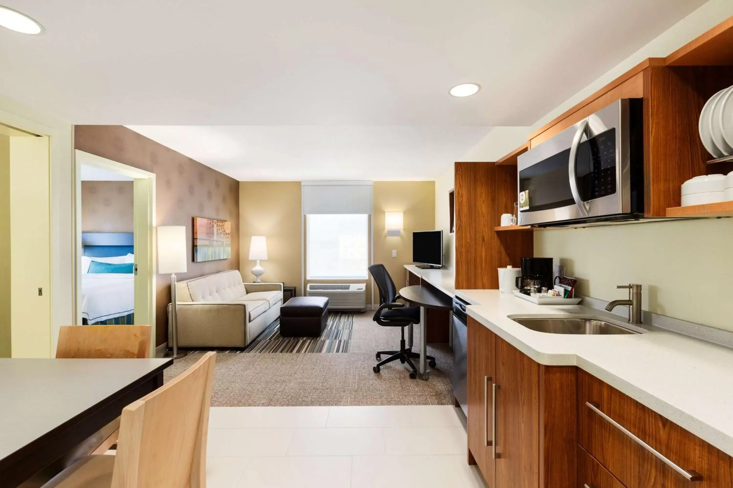 Bedroom, Kitchen/Kitchenette in Home2 Suites By Hilton Omaha West