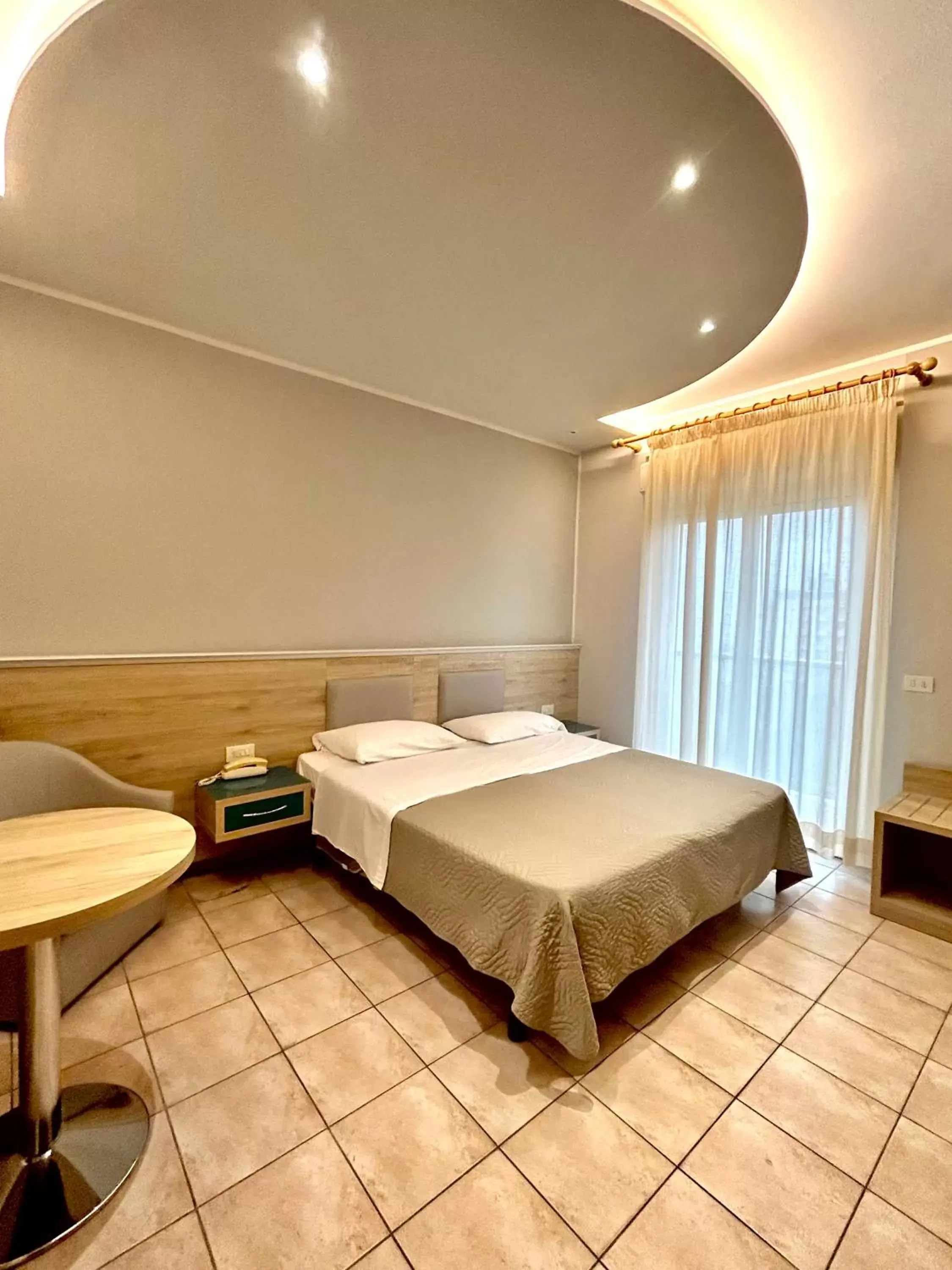 Property building, Bed in Hotel Adria