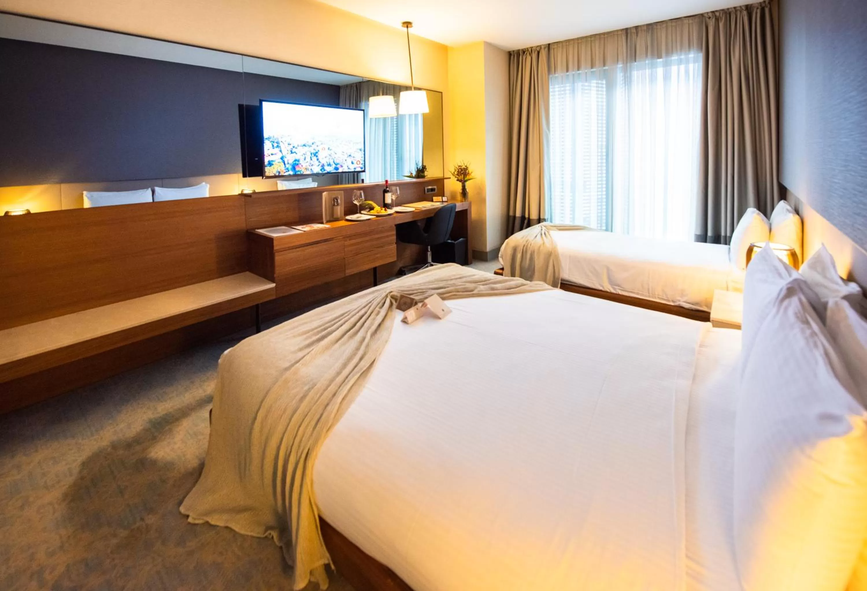 Bed in Dosso Dossi Hotels & SPA Downtown