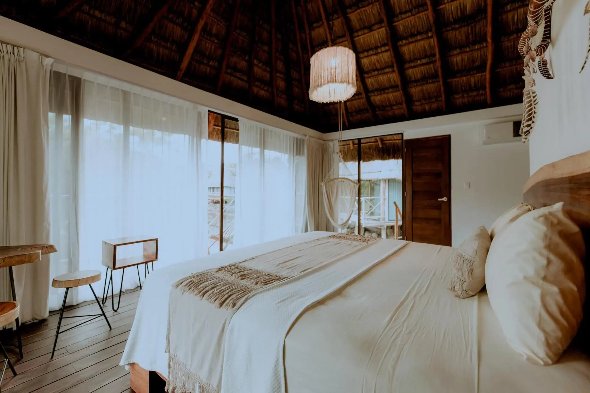 Bed in Zamna eco-lodge Tulum