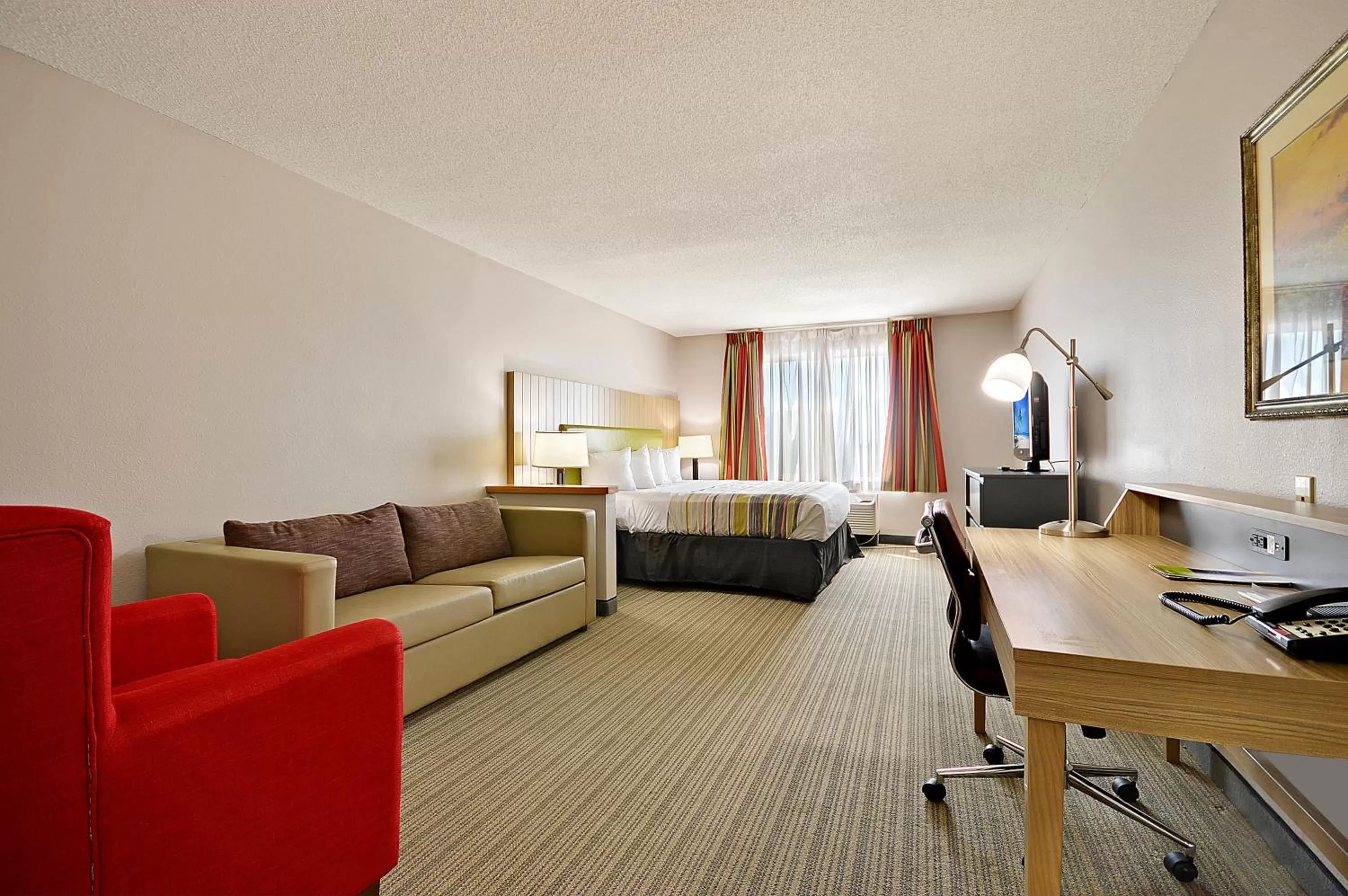 Living room in Country Inn & Suites By Radisson, Charleston North, SC