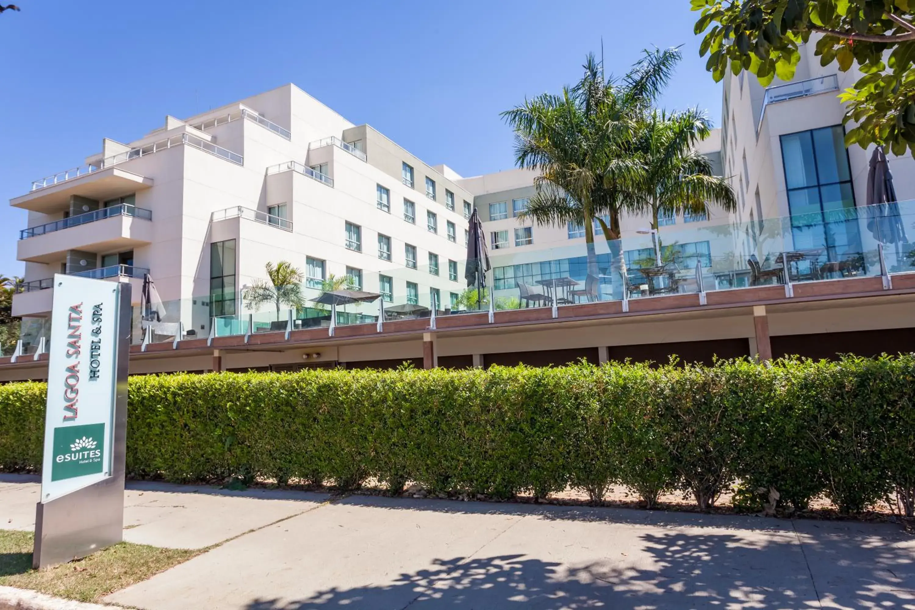 Property logo or sign, Property Building in eSuites Spa Lagoa Santa Property logo or sign, Property Building in eSuites Spa Lagoa Santa