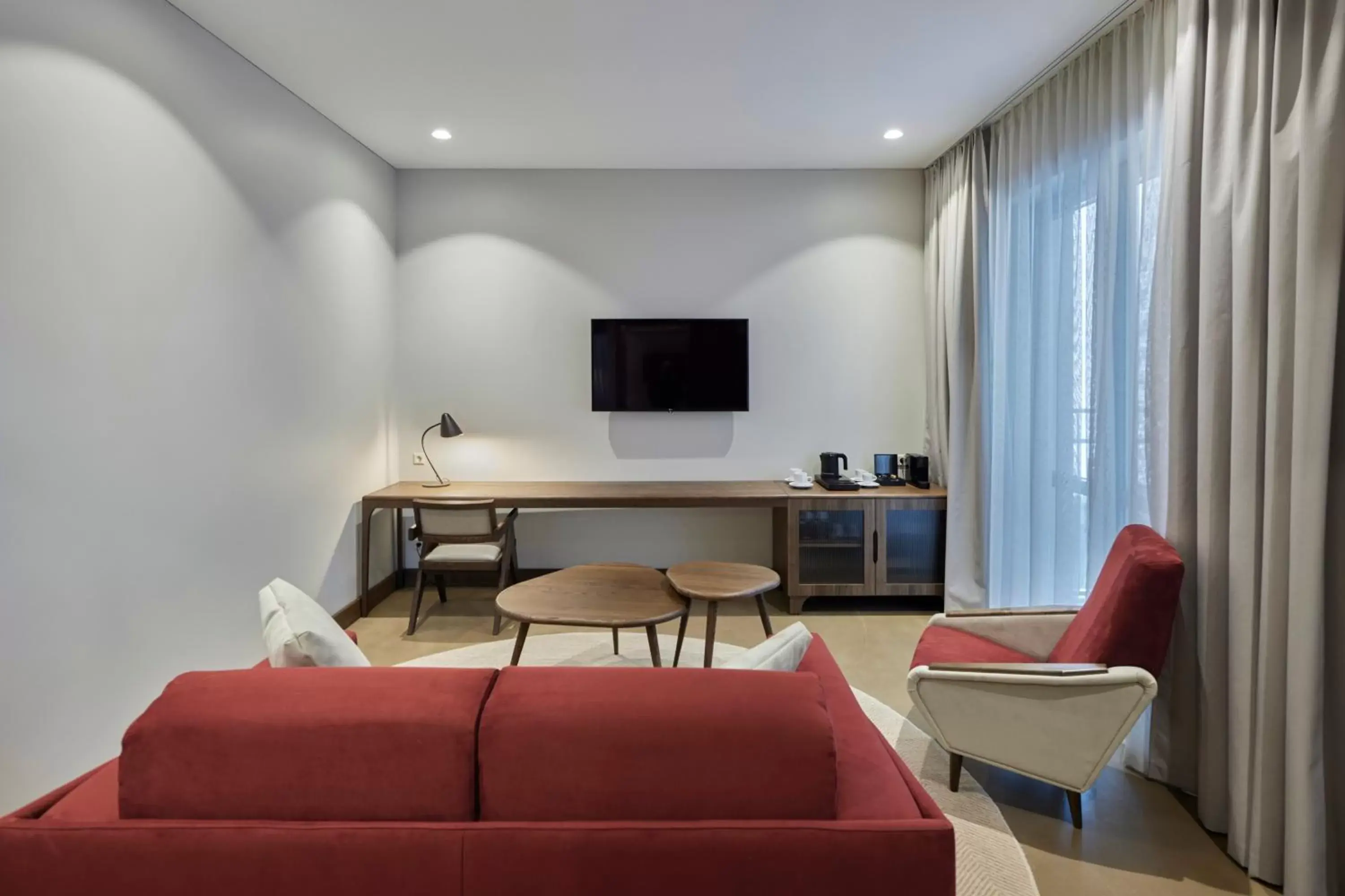 TV and multimedia, TV/Entertainment Center in Neringa Hotel